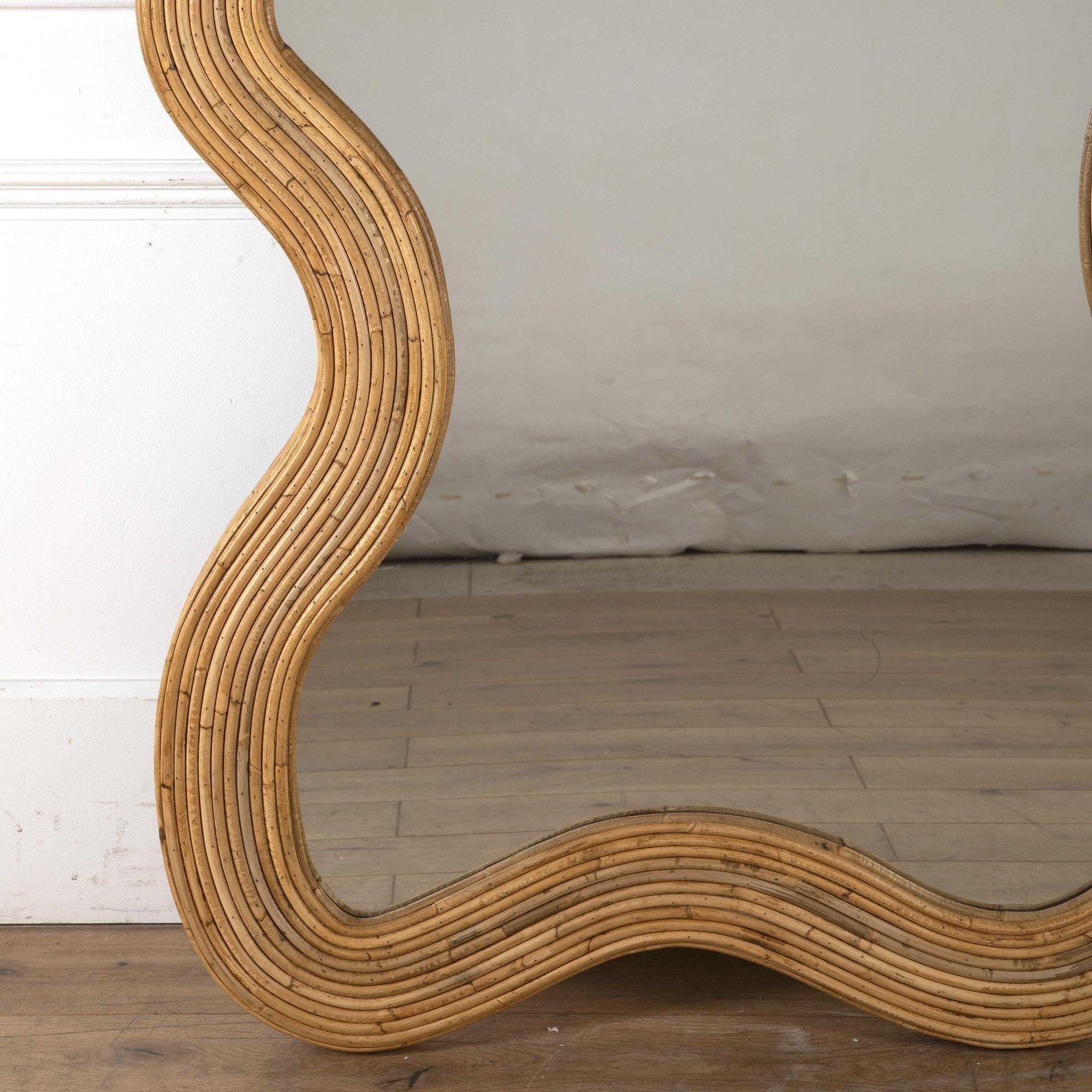 Large mid-century Italian Vivai Del Sud style bamboo mirror.
With it's fantastic wavy bamboo frame this mirror would be a stylish addition to any interior, especially within a dressing room.