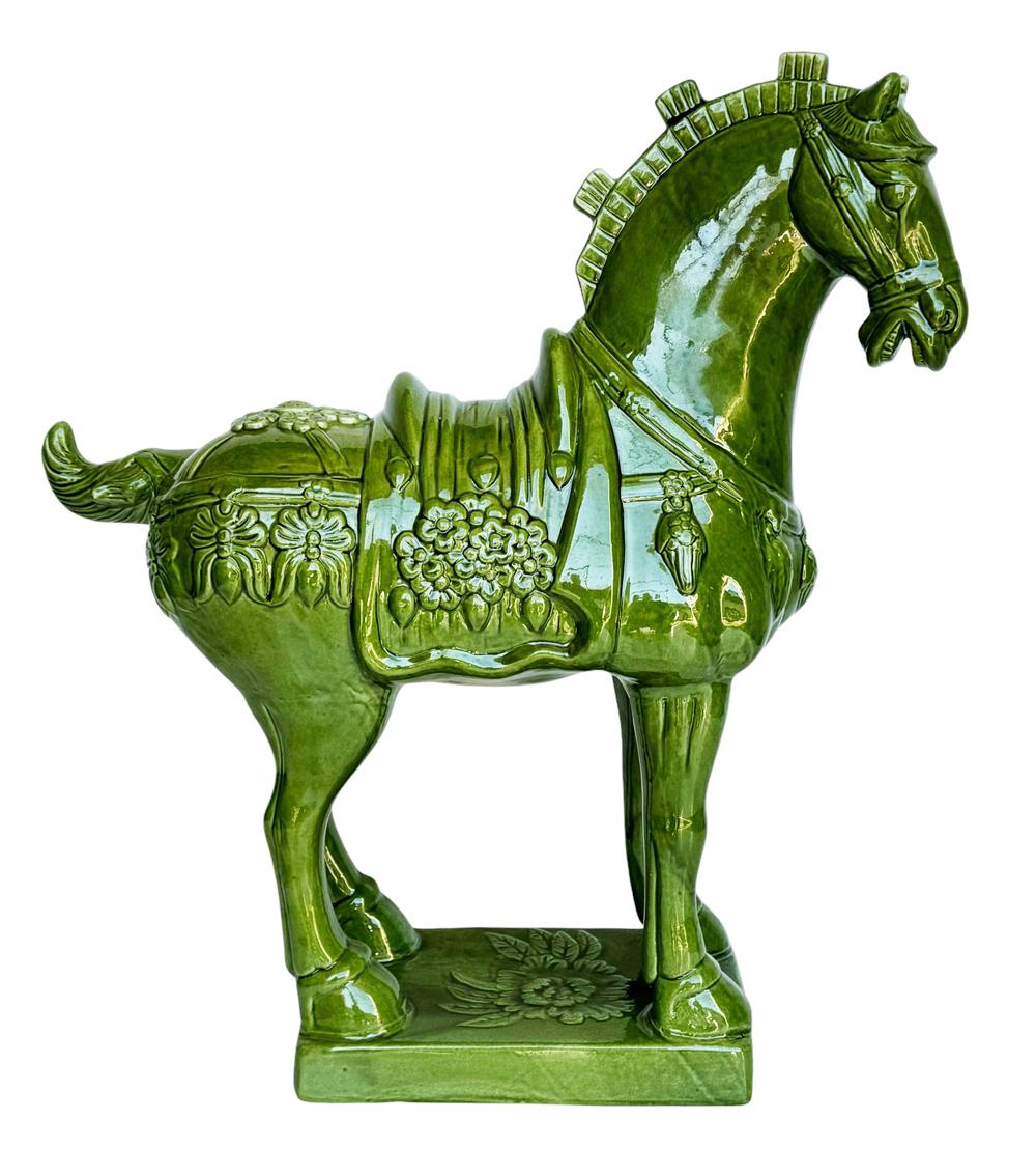 A large and chic horse sculpture circa 1960s, probably Italian. This piece features all glazed ceramic construction in a beautiful green color. 