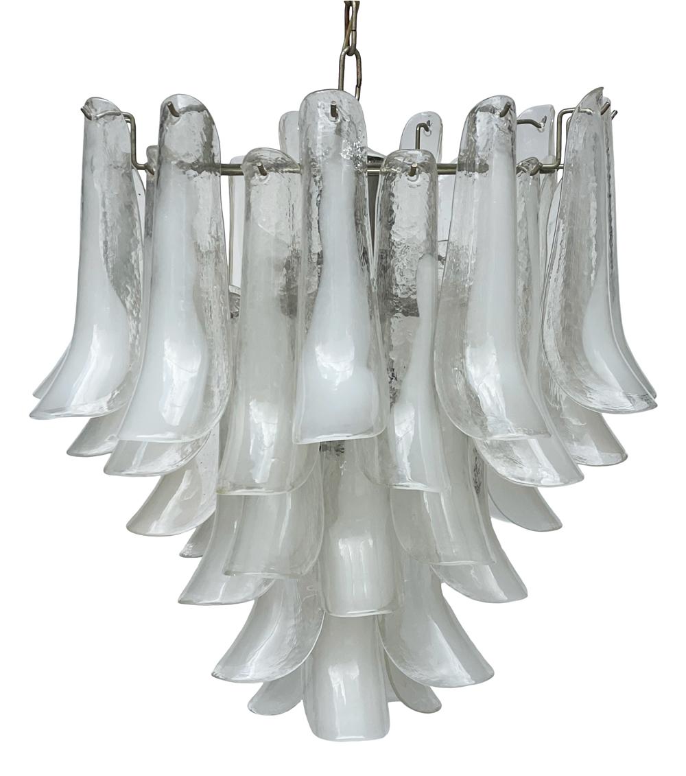 A large and impressive Mazzega chandelier from Italy circa 1970. The light consists of chrome framing and 39 large art glass prisms. It takes 10 light bulbs. Tested and working.