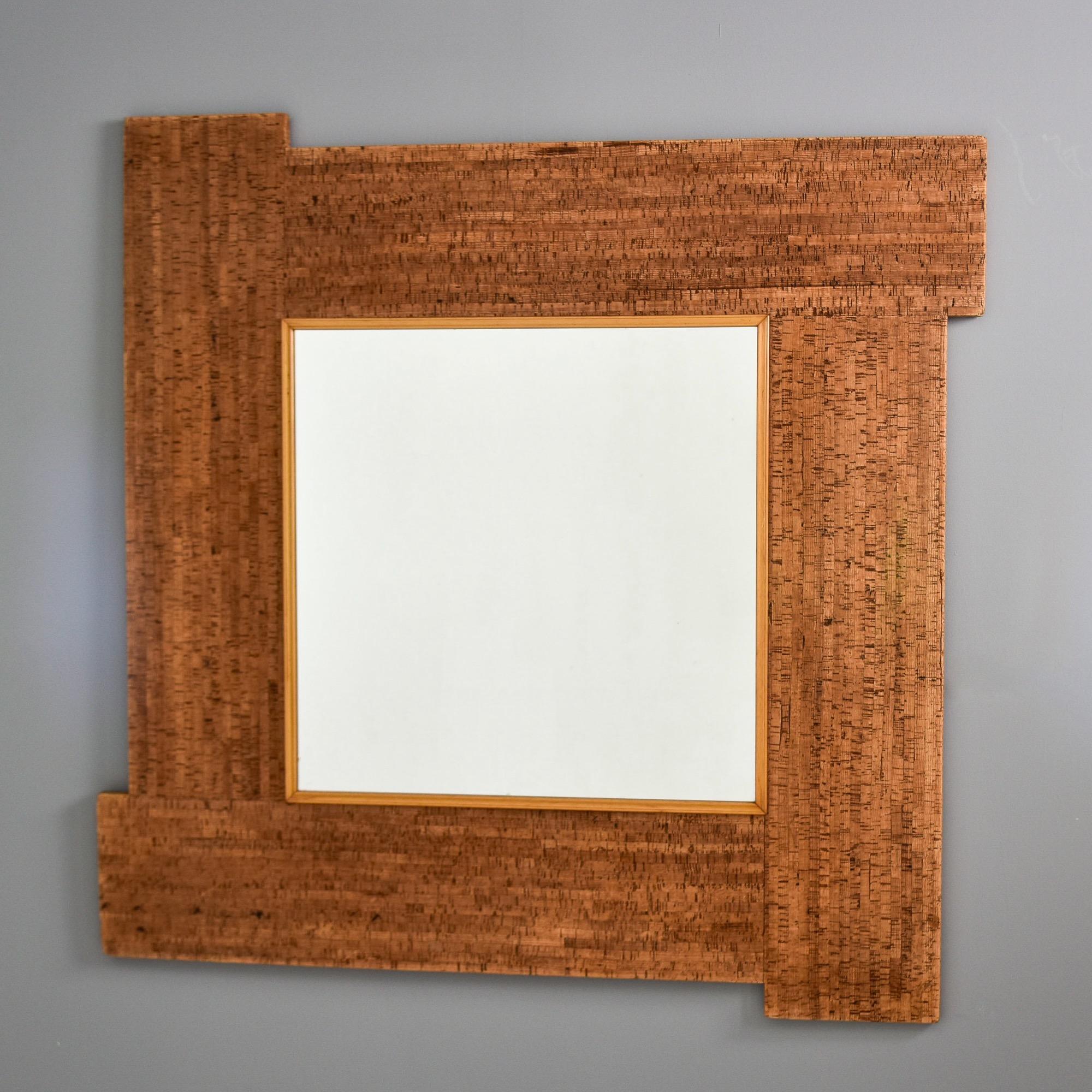 Found in Italy, this large, square cork-framed mirror dates from the 1970s. Bold and mod styled square wall mirror measures just over four feet square. Unknown maker. 

Excellent vintage condition with no flaws found. 

Actual Mirror Size:  26” high