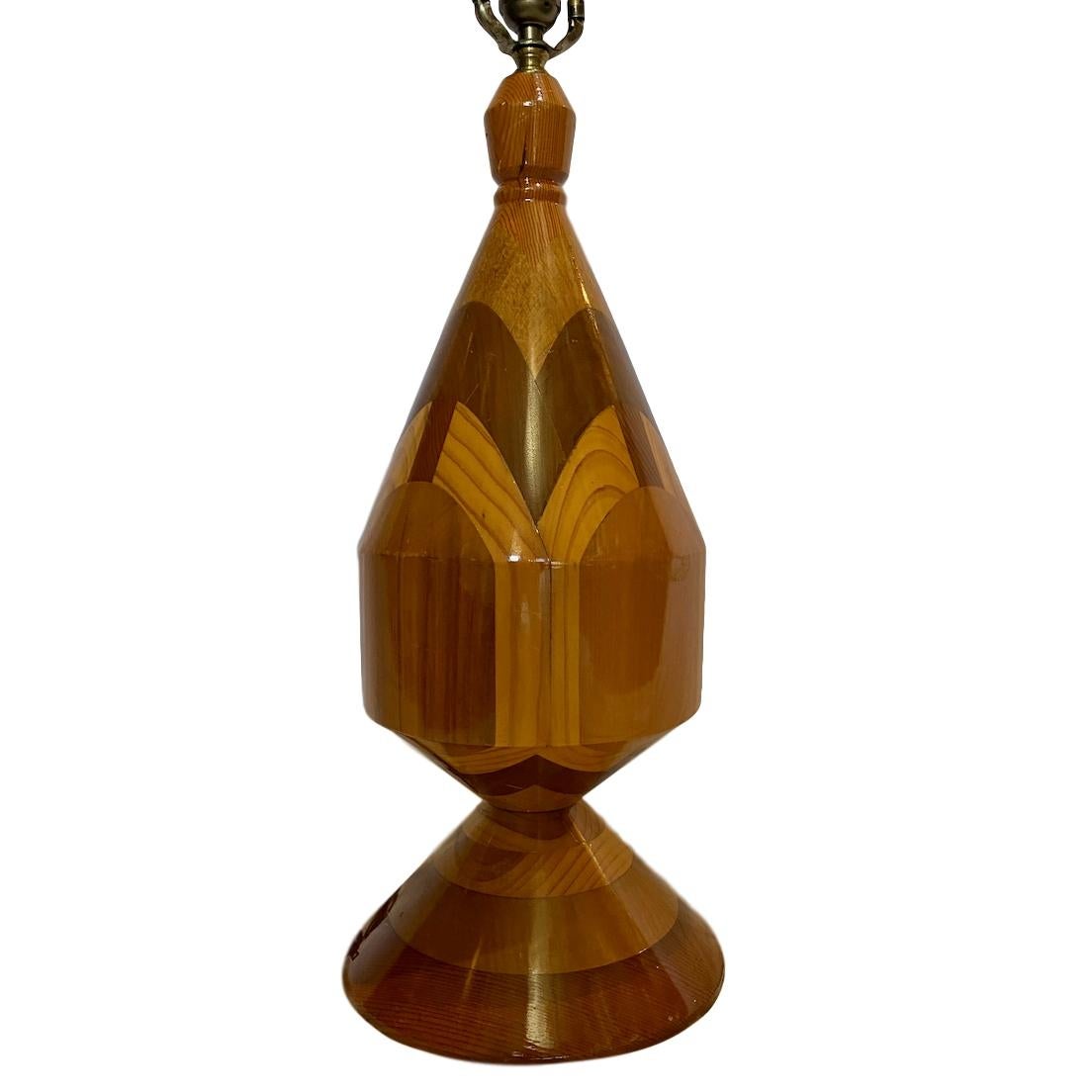A large single circa 1960s Italian marquetry wood lamp.

Measurements:
Height of body 23