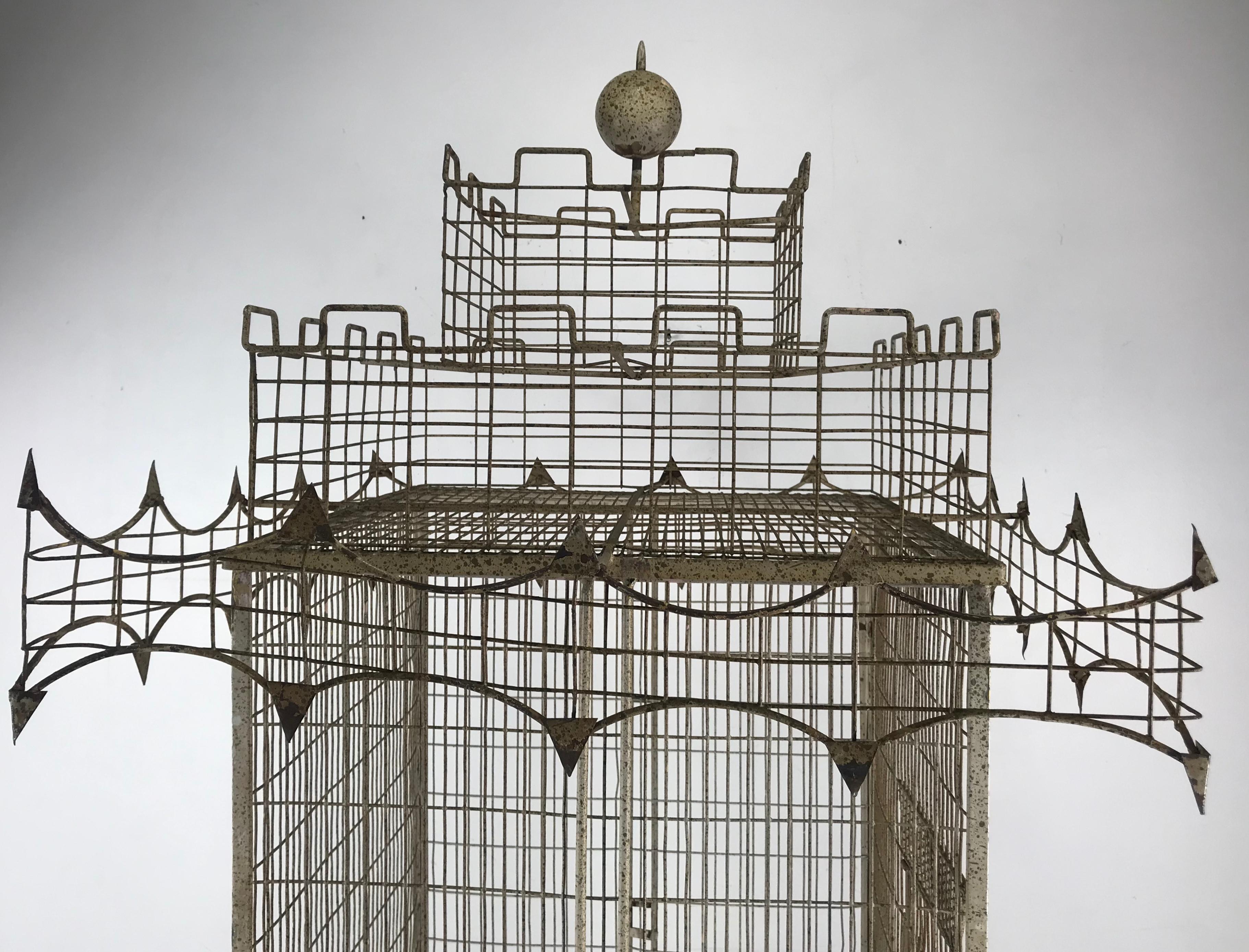 Large Mid-Century Modern Architectural, whimsical bird cage, sculpture by Frederick Weinberg. Extremely rare version. Painted metal wooden balls, retains original finish, patina color and surface, minor paint loss, rust to bottom pullout / pull-out