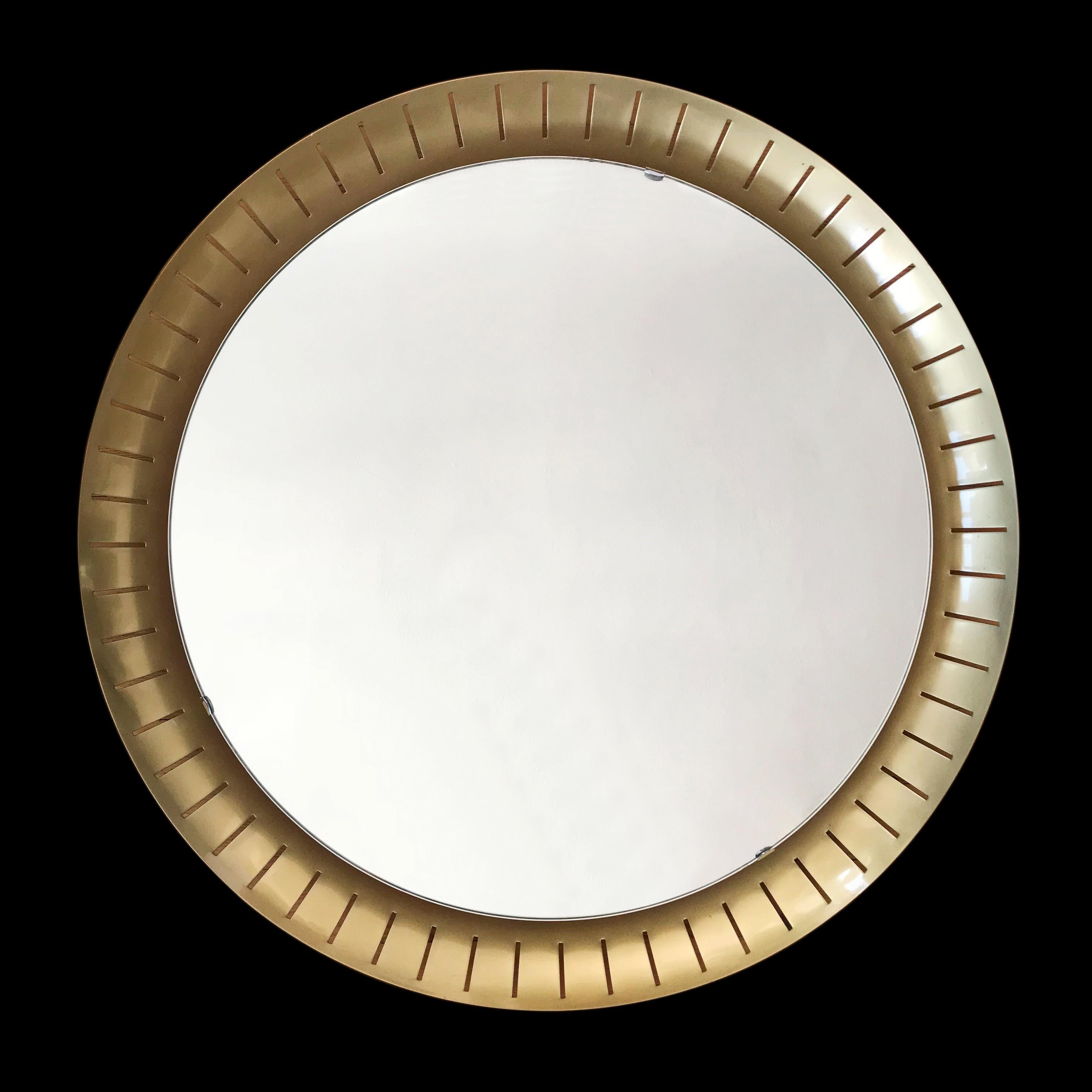 Elegant and large Mid-Century Modern backlit wall mirror. Manufactured by Hillebrand, 1950s, Germany. 

These mirrors are often offered as from Stilnovo, Italy. It is not correct. They appear only in Germany. I'm sure they were manufactured in