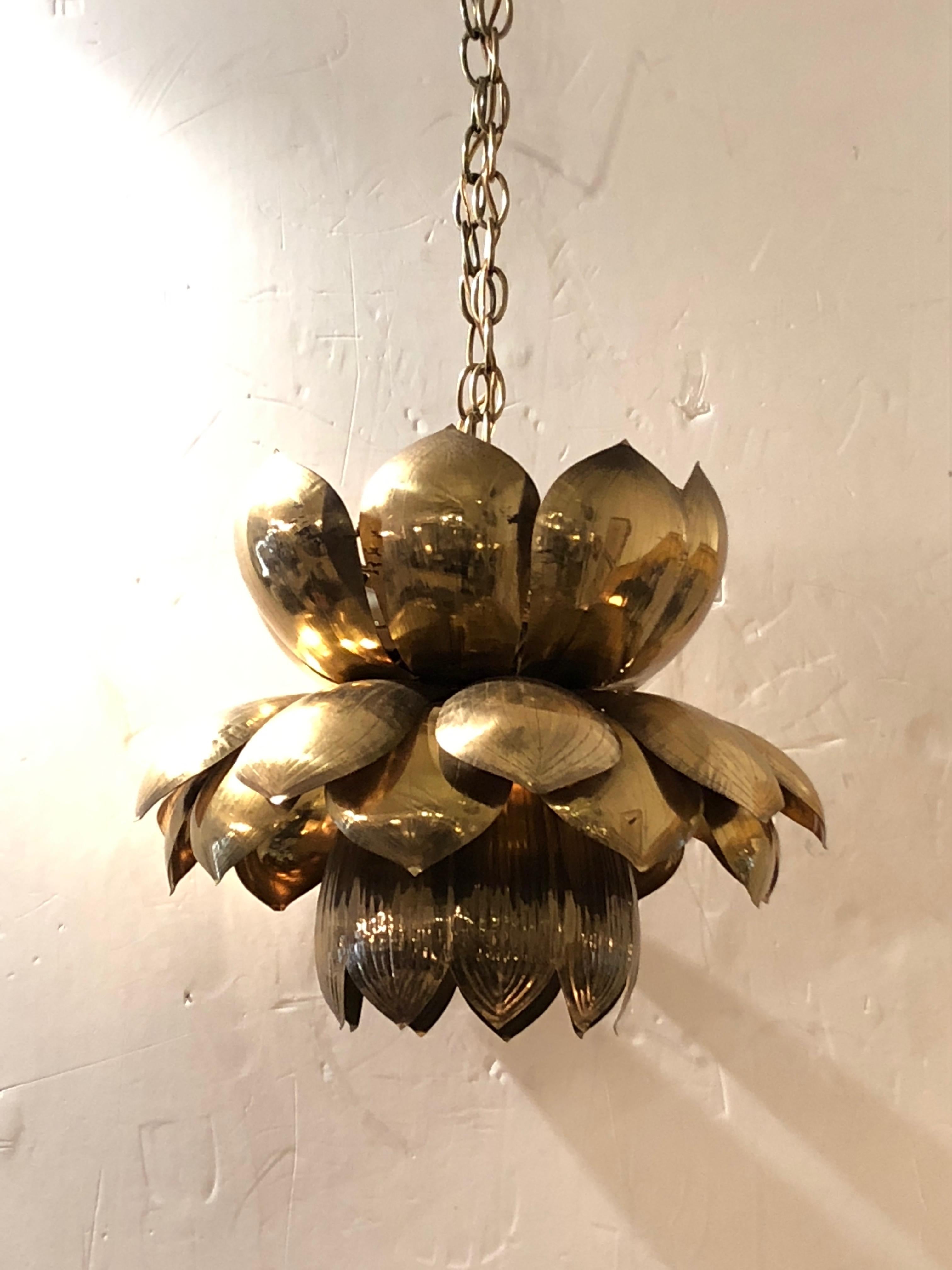 Parzinger style lotus shaped brass pendant chandelier made by Feldman Lighting, an iconic Mid-Century Modern shape having original wiring, 3 bulbs in the top and 1 bulb in the bottom. 3 ft. of ample chain included.