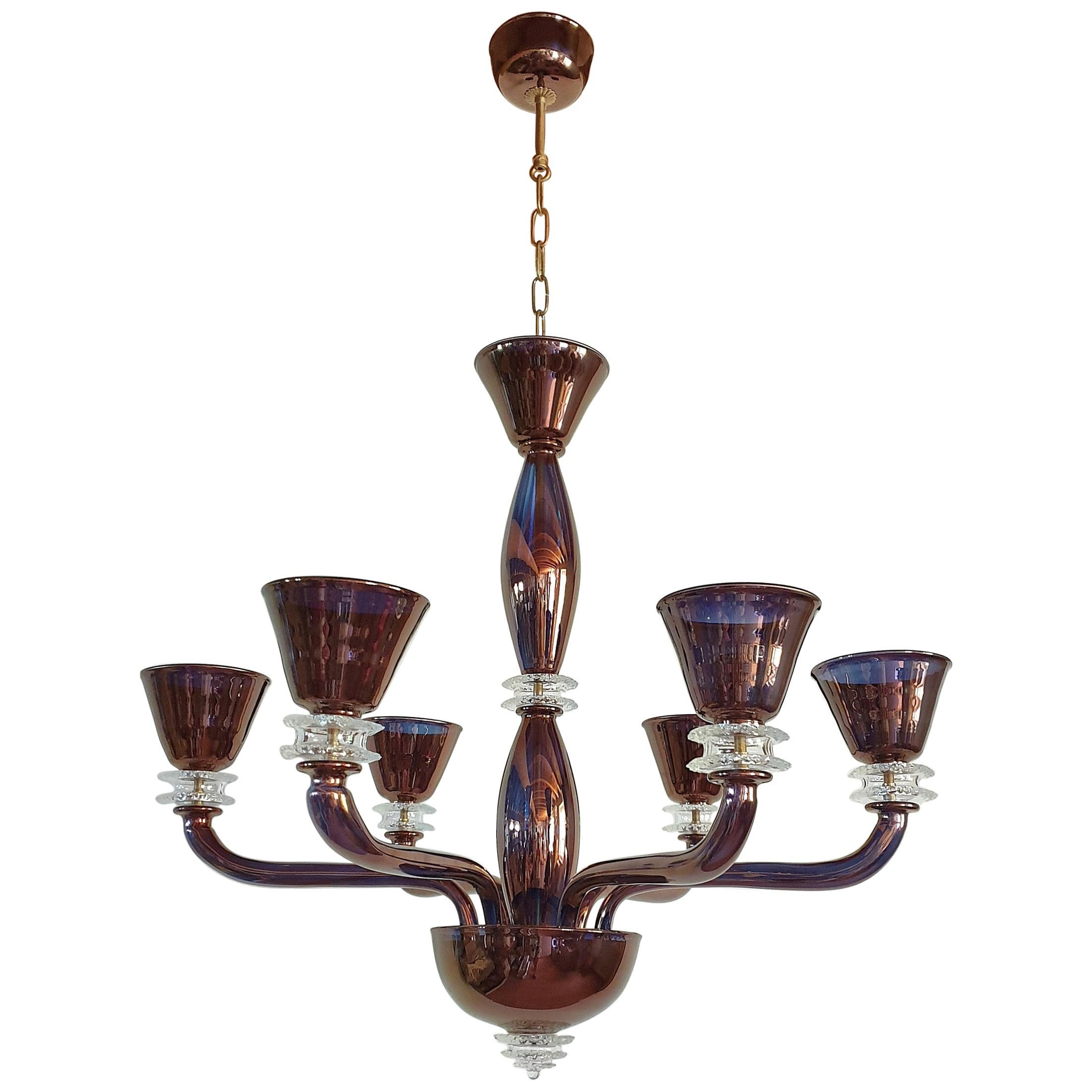 Large six lights Murano glass chandelier, Mid-Century Modern, attributed to Seguso, Italy, circa 1970s.
Very unique and elegant bronze color mirrored Murano glass: through the light, you can see some transparency, and color changing to blue.
The
