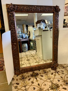 Large Ornate Mid Century Chinoiserie Heavily Carved Wood Mirror With Foo Dogs