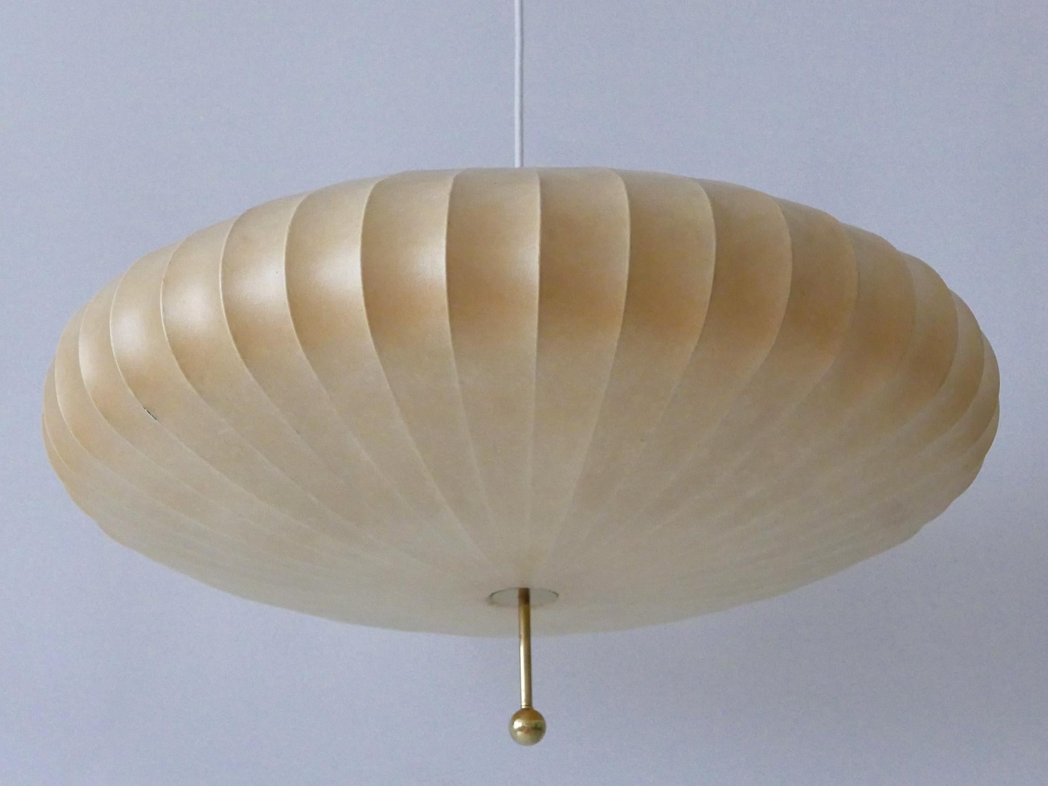 Large, extremely rare and highly decorative Mid-Century Modern cocoon pendant lamp or hanging light. Designed & manufactured probably by Goldkant Leuchten, Germany, 1960s.

Executed in sprayed latex material, brass and metal, the pendant lamp needs