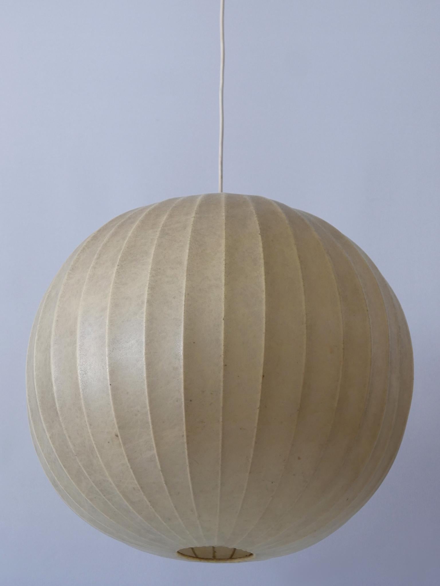 Highly decorative and large Mid-Century Modern cocoon pendant lamp or hanging light. Designed & manufactured probably by Goldkant, Germany, 1960s.

Executed in sprayed latex material and metal, the pendant lamp needs 1 x E27 / E26 Edison screw fit