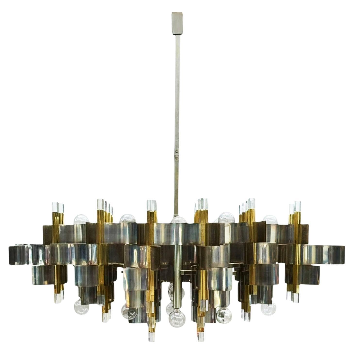 Grand lustre en chrome et laiton italien moderne du milieu du siècle par Gaetano Sciolari en vente