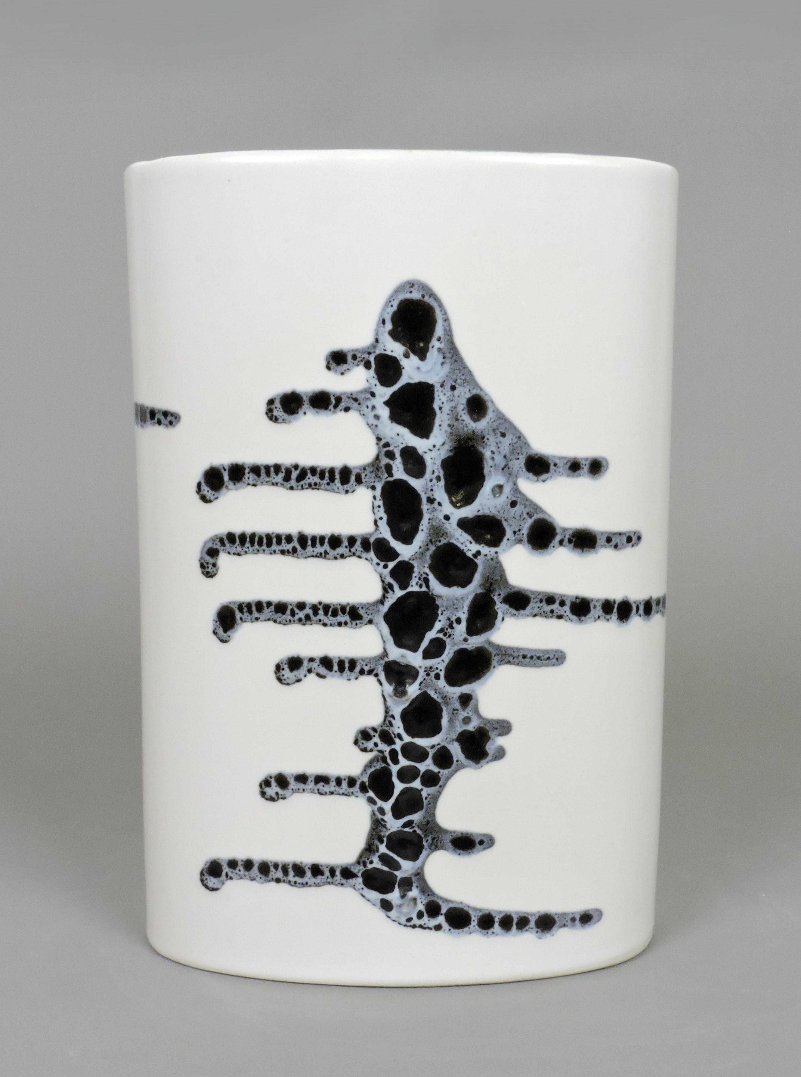 Large and striking modernist ceramic vase by Lapid of Israel. This vase has a white background with a black and gray 