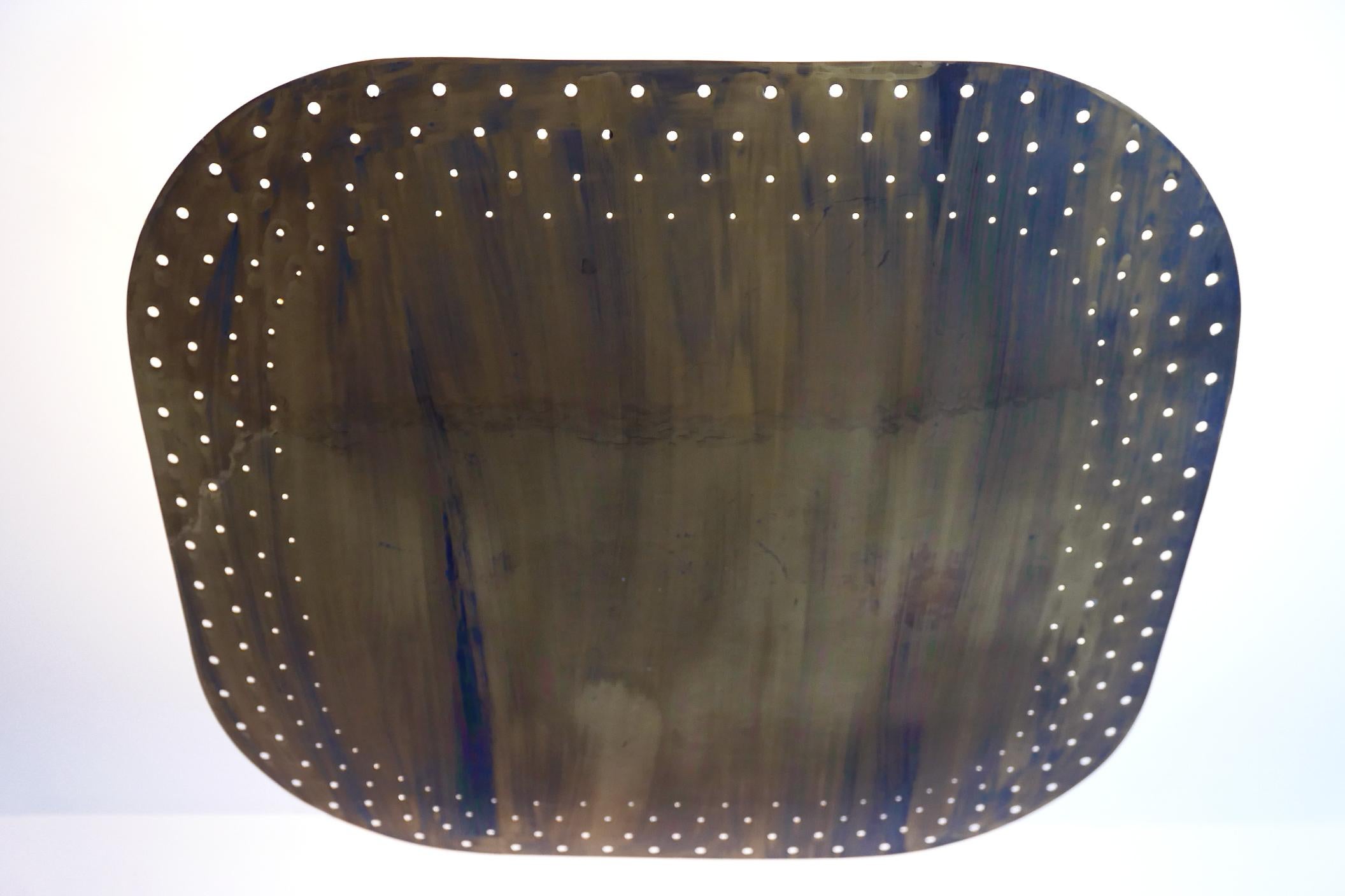 Rare, elegant and large Mid-Century Modern perforated brass ceiling fixture / pendant lamp. Designed and manufactured in Germany, 1950s.

Due to the perforated shade, the lamp makes a breath taking light effect.

Executed in perforated brass
