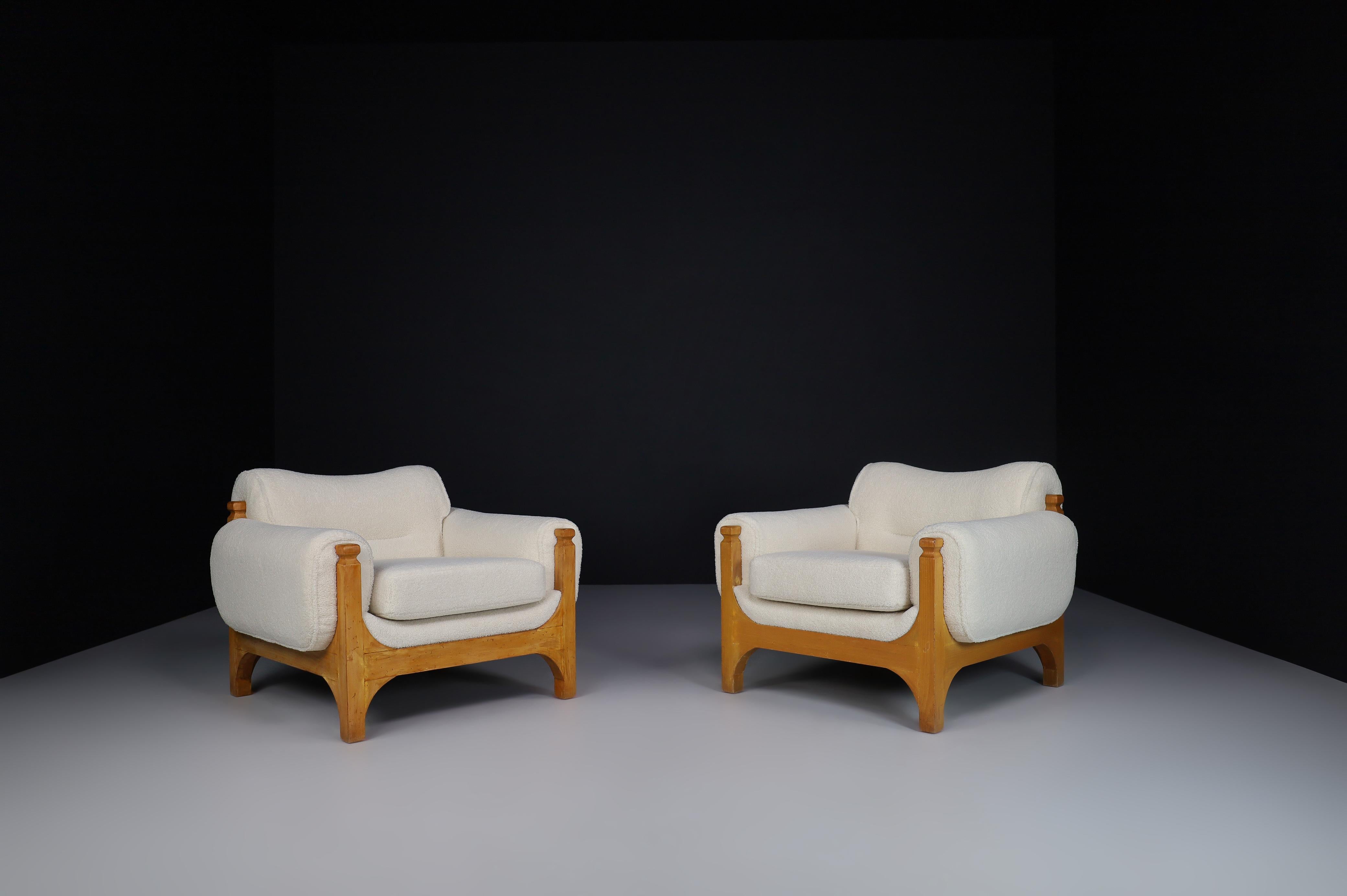 Mid-Century Modern pine and teddy lounge chairs, Italy, 1960s.

Mid-Century Modern pine and teddy lounge chairs, Italy, the 1960s. Pair of two oversized Mid-Century Modern lounge chairs in patinated pine wood and Re-upholstered in a teddy fabric,