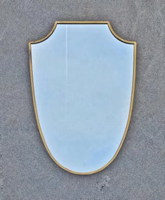 Large Mid Century Modern Shield-shaped Mirror in Brass frame, Italy 1950s