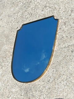 Large Mid Century Modern Shield-shaped Mirror in Brass frame, Italy 1950s