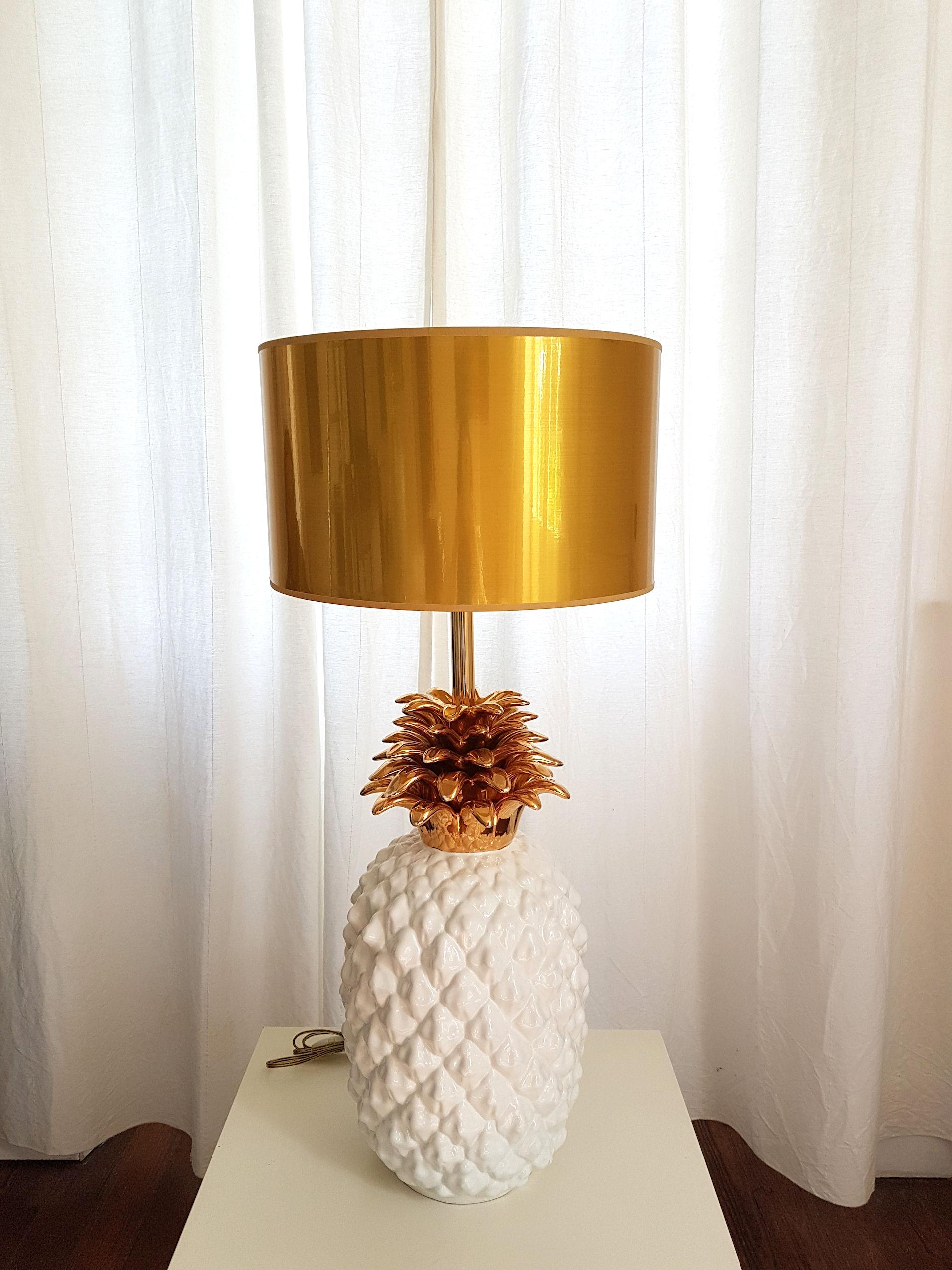 Large ceramic white and gold pineapple French lamp, 
by Maison Lancel, Paris, circa 1970s.
Mid-Century Modern lamp.
In excellent condition, rewired.
Gold shade, sold together.