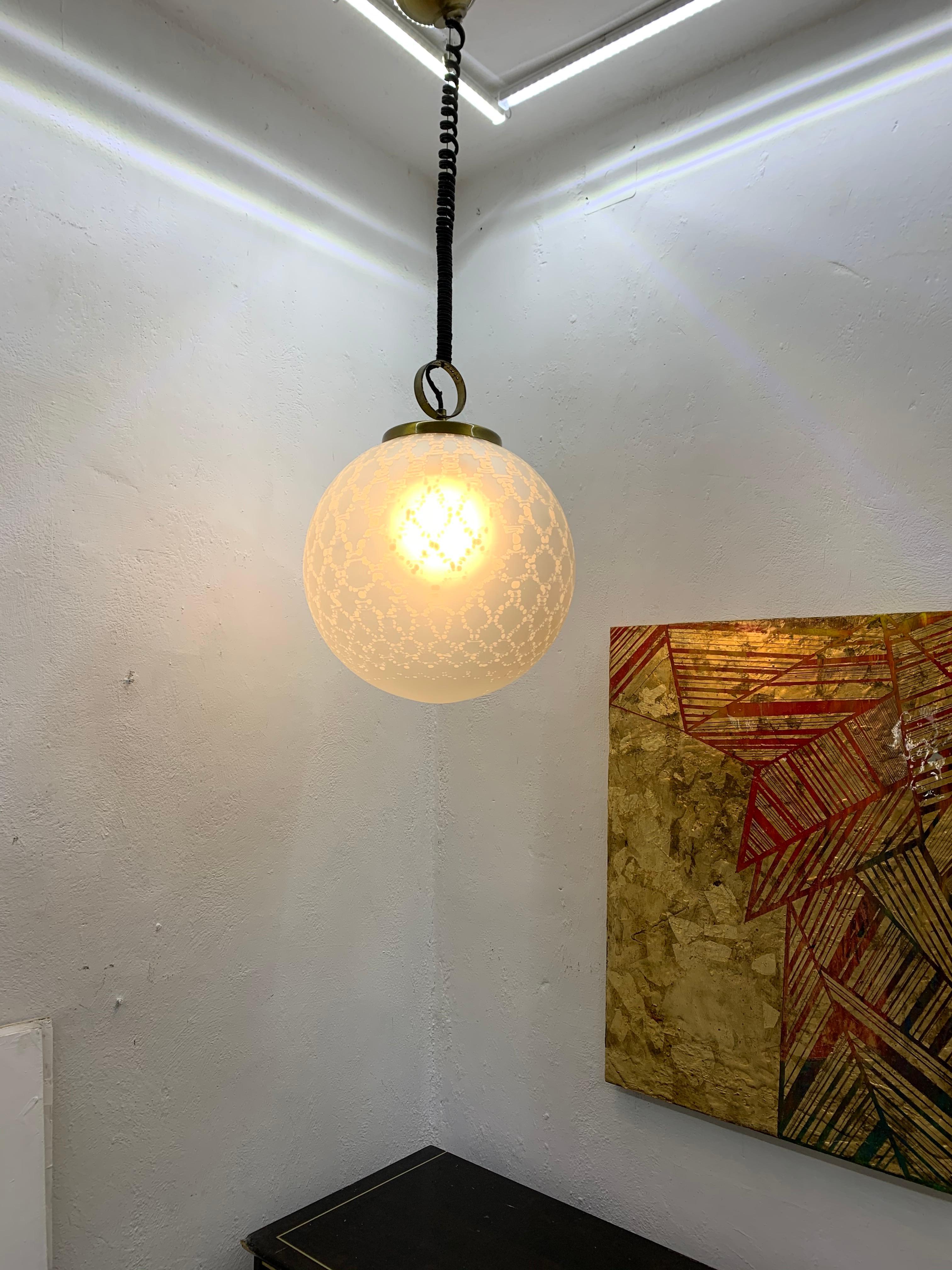 Large Space Age pendant light. White frosted hand blown Murano glass sphere with a 