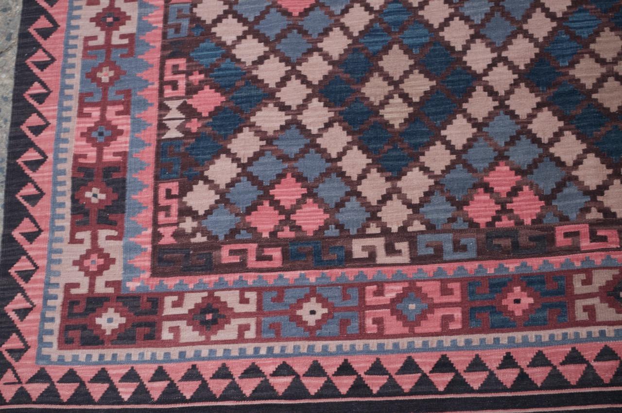 Moroccan flat-weave Kilim rug in jewel tones circa late 1940s-early 1950s. Large size: D: 108