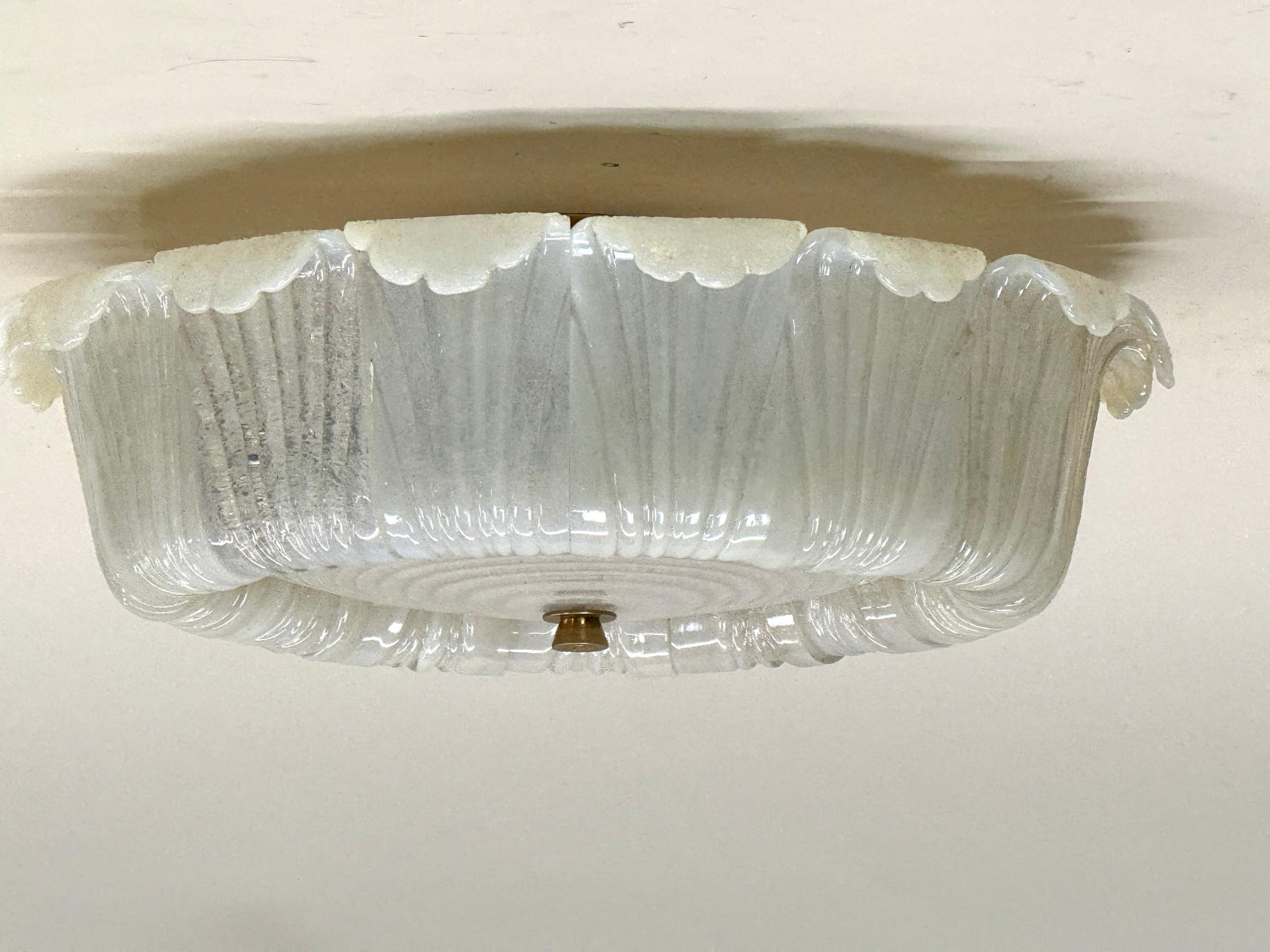 A Large, Elegant and Original, Italian Mid-Century Modern Hand-Blown Murano Glass Flush Mount Chandelier by Barovier e Toso, circa 1940. The piece reflects the artistry and elegance of Italian 1940 design presenting an ethereal, dream-like piece