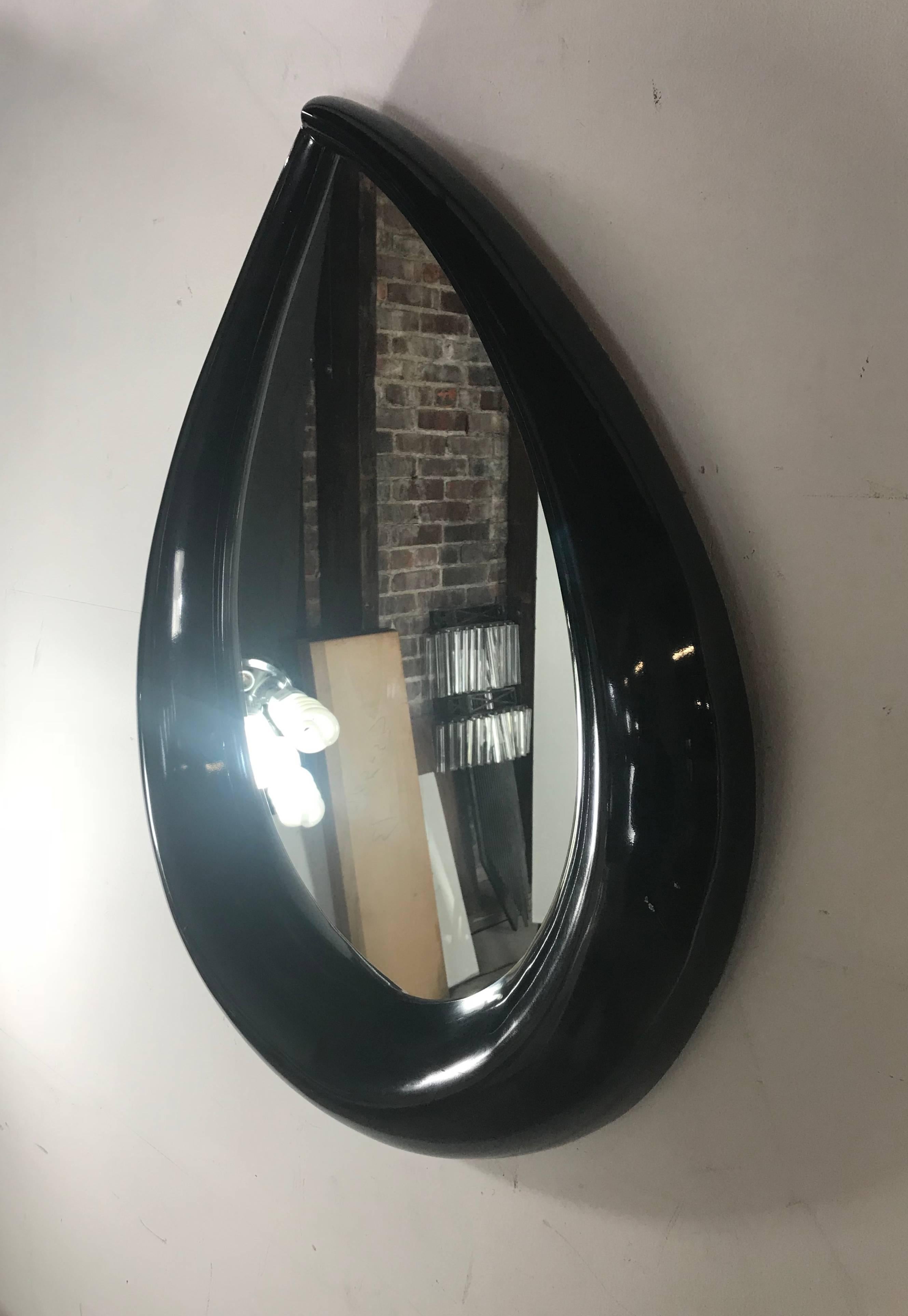 Large Mid-Century Modern teardrop mirror in black lacquer, Classic pop modernist, thick black lacquered frame.