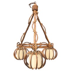 Grande lampadario in rattan di metà secolo Louis Sognot
