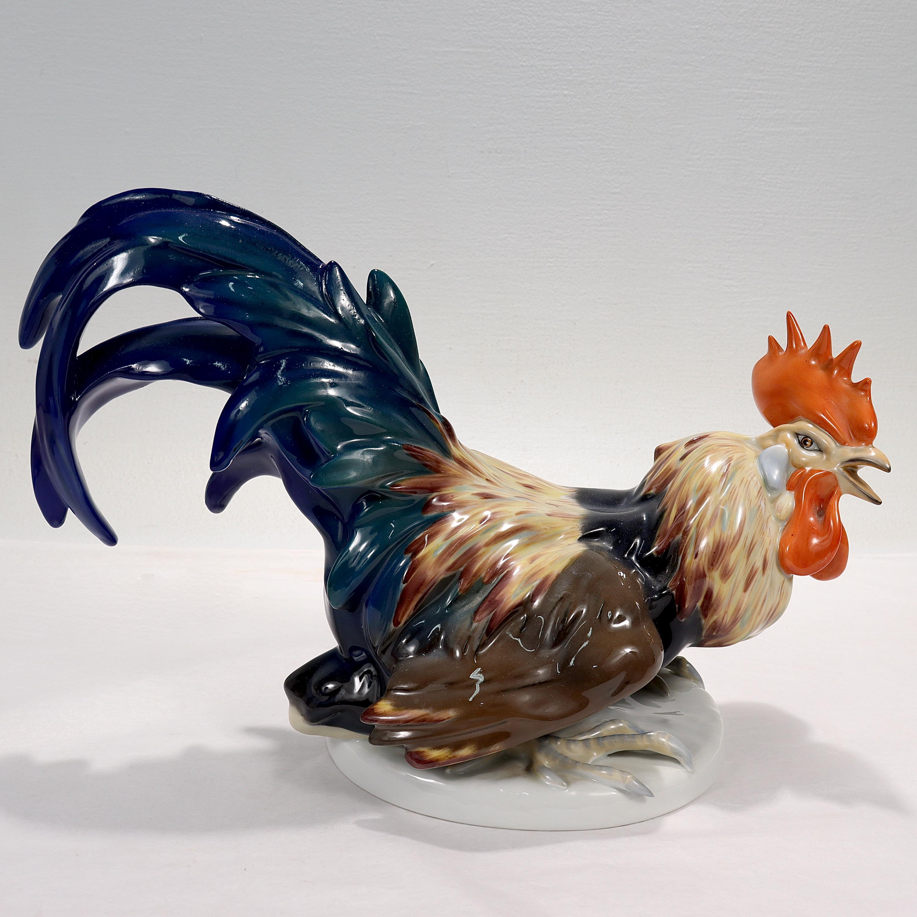 A fine mid-century Rosenthal porcelain figurine.

In the form of a rooster.

Designed by J. Feldtmann in the 1950s for Rosenthal.

Simply a wonderful rooster figurine! 

Date:
1950s

Overall Condition:
It is in overall good, as-pictured,
