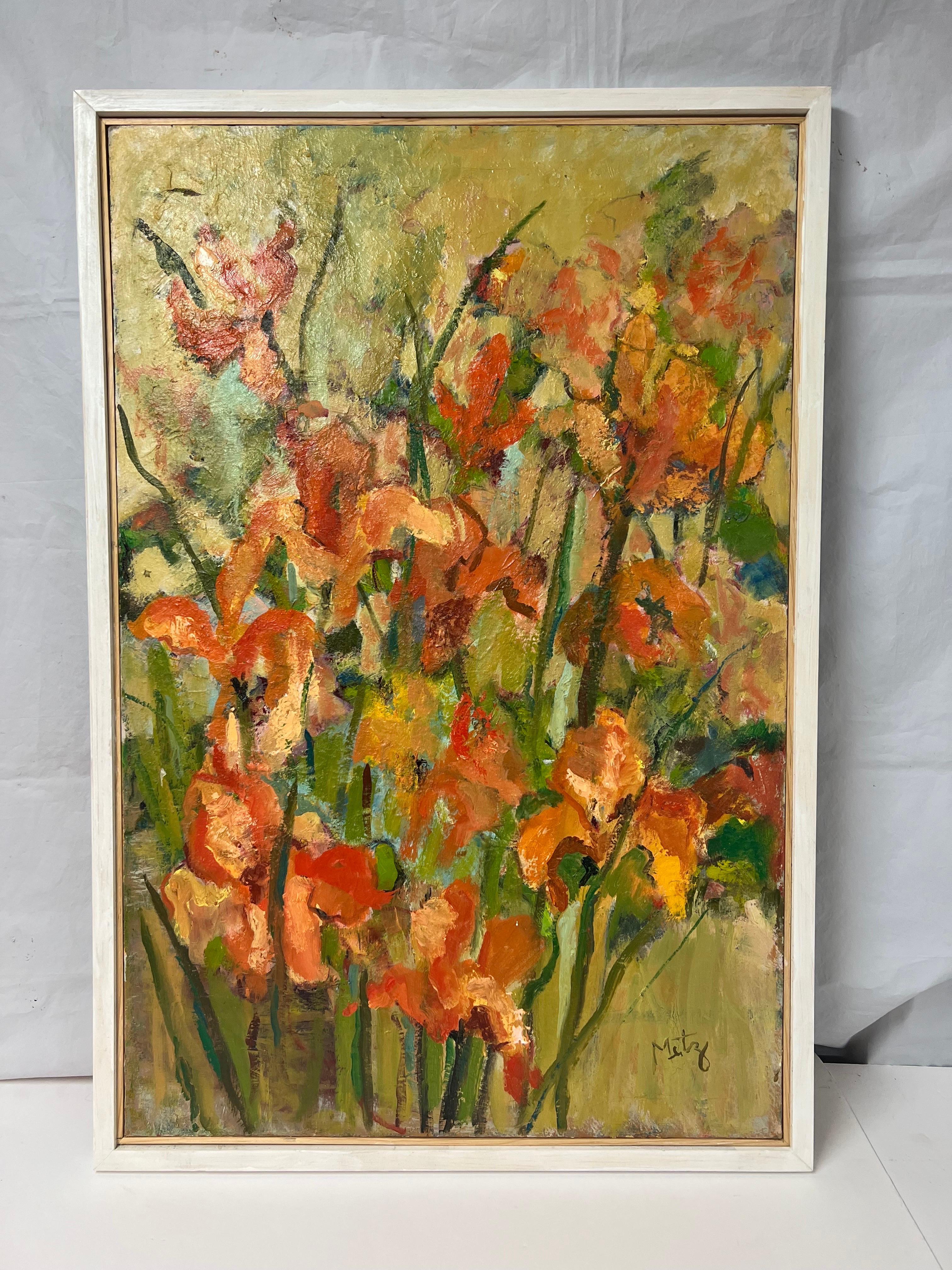 Large Mid Century Still Life of Flowers Signed Metz. Framed in a plain white wooden frame. The colorful Impasto composition consists of Large Pinkish Orange gladiolas. This vibrant and cheery painting will brighten any room. 