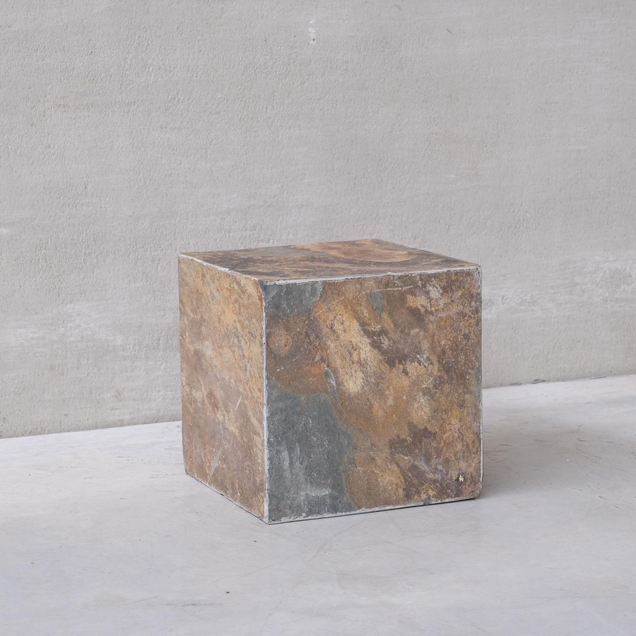 An unusual stone cube.

Belgium, circa 1970s.

Hollow but the cube has a stone face on each side including the base.

Ideal as an over sized side table or perhaps a display for art or a retail unit.

Location: Belgium Gallery.

Dimensions: