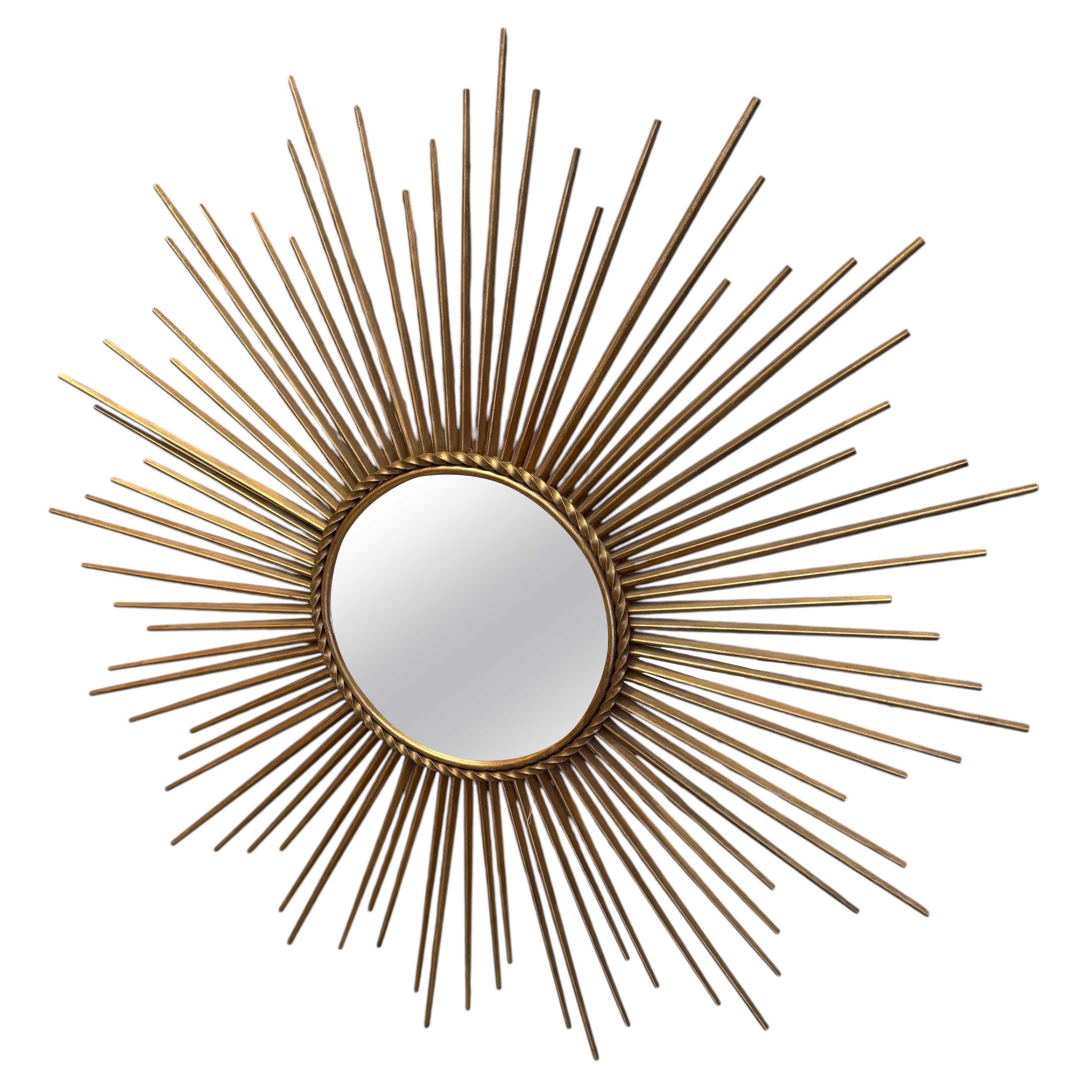 Large mid century sun burst mirror by chaty Vallauris For Sale