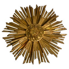 Vintage Large Mid Century Sunburst ceiling or wall light in Gilt Wood