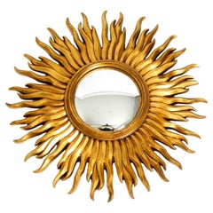 Large Mid Century Sunburst Kovex wall mirror made of wood and resin, gold-plated