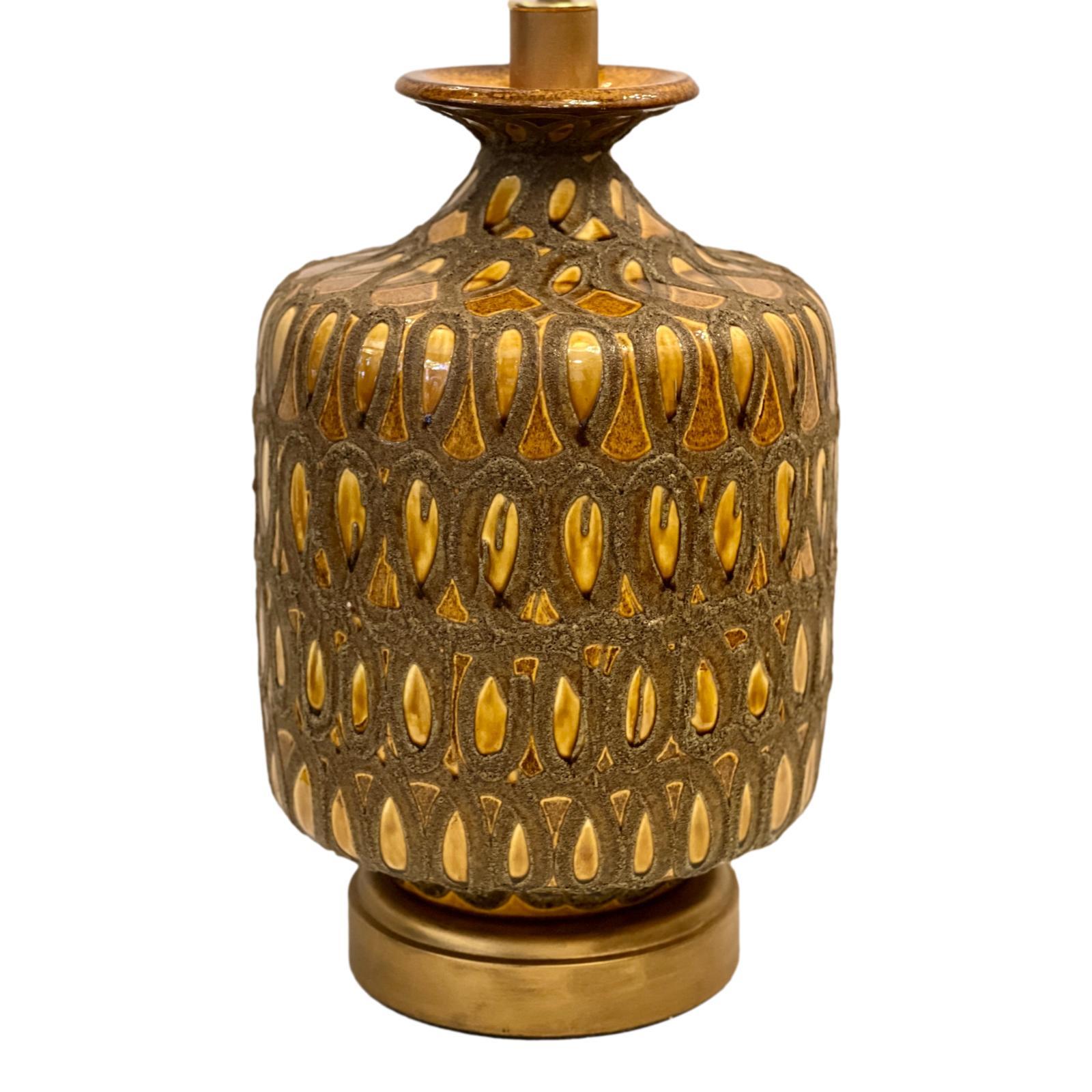 Italian circa 1960's ceramic table lamp with bronze base.

Measurements:
Height of body: 20