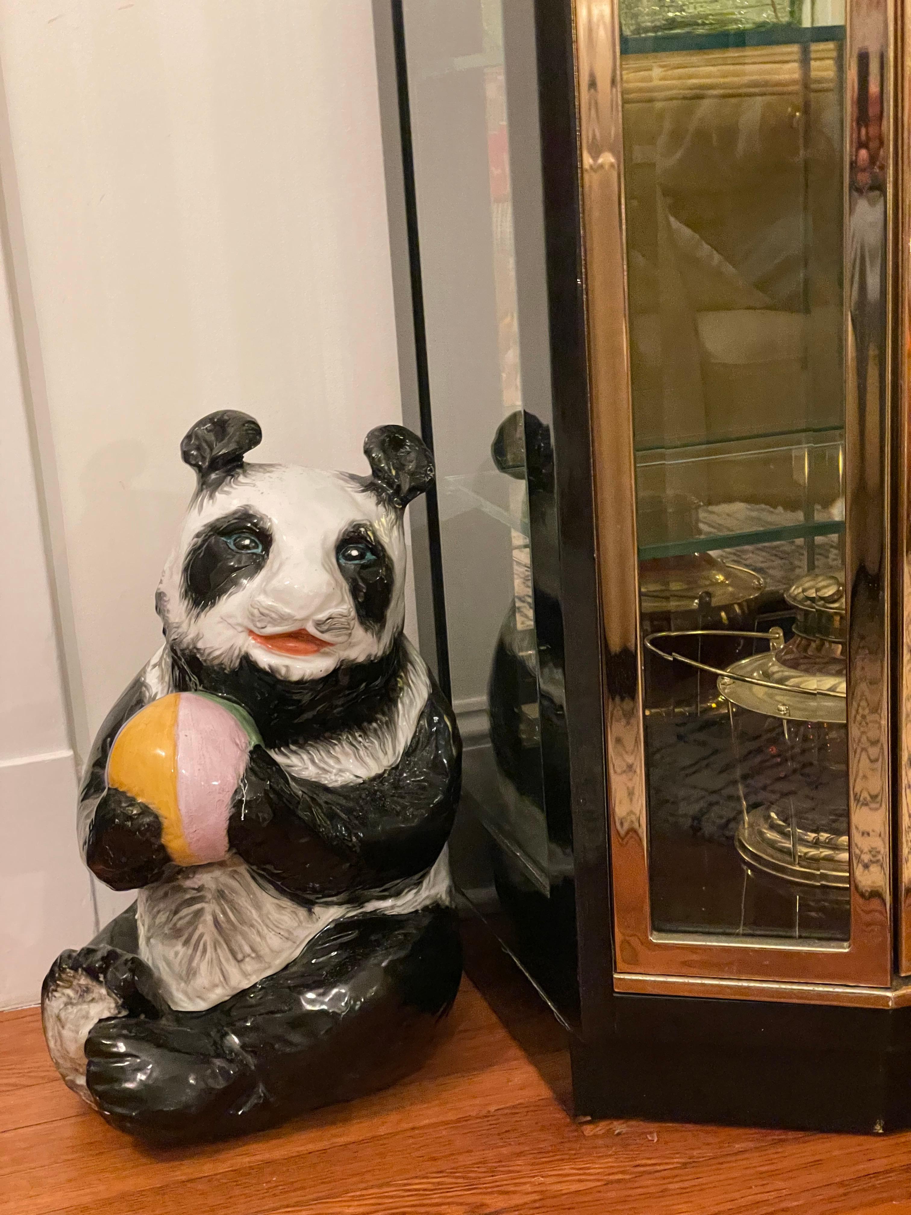 Glazed terracotta Panda Bear sculpture or figure. This beautiful Panda Bear is in excellent condition and dates back to the 1960s. Cute whimsy with beach ball accent.