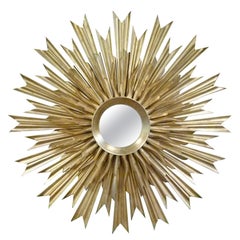 Large mid-century three layered gold-wood sunburst wall mirror.