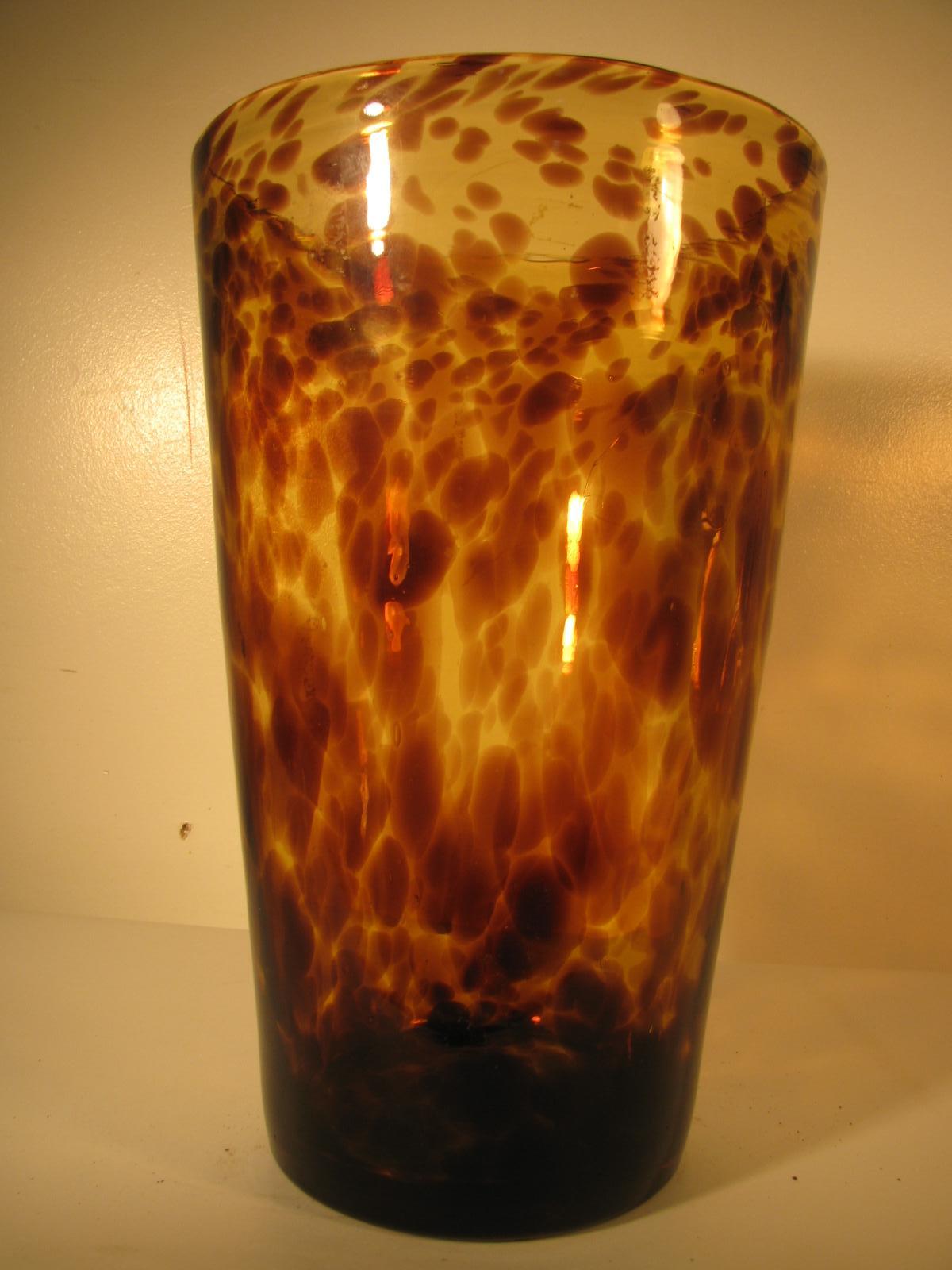 Beautiful vase created in Murano using the tortoiseshell decoration technique. Tall (11.75in) and very elegant vase tapers from 5in. to 7.5in. as it rises. Polished pontil on base.