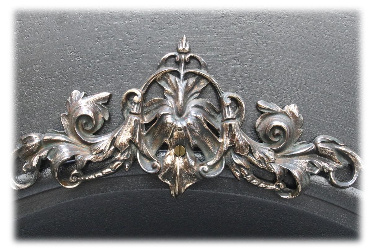 Large mid Victorian cast iron arched fireplace insert with finely cast ornate bronze mounts. Circa 1870

This is supplied with a replacement clay fire back and cast iron stool grate. And has been finished the traditional black grate polish,