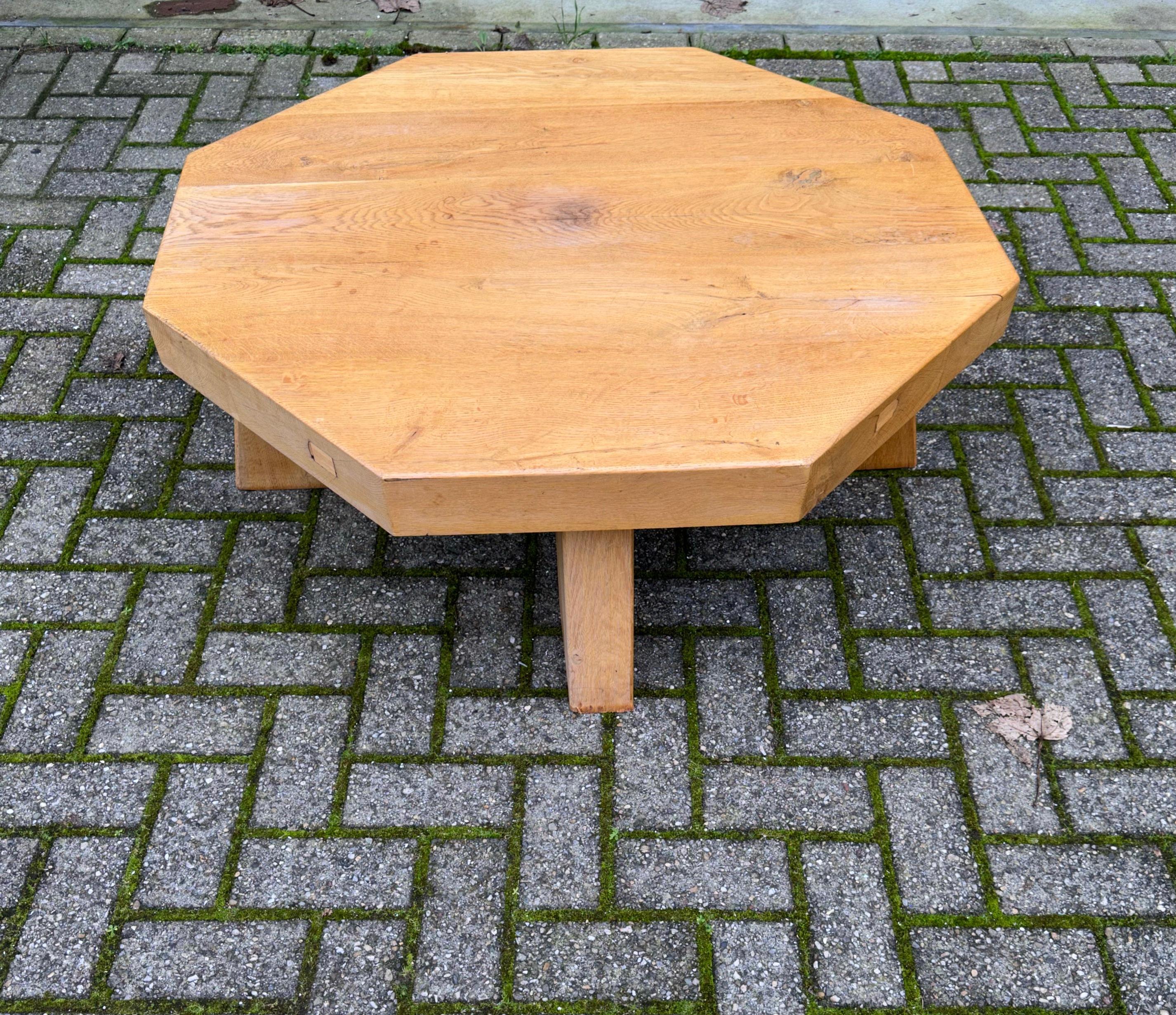 Robust and great looking, natural materials table.

This all-natural and entirely hand-crafted coffee table from circa 1960-1970 is a real eyecatcher and highly practical at the same time. Both in diameter and in height this could be THE perfect