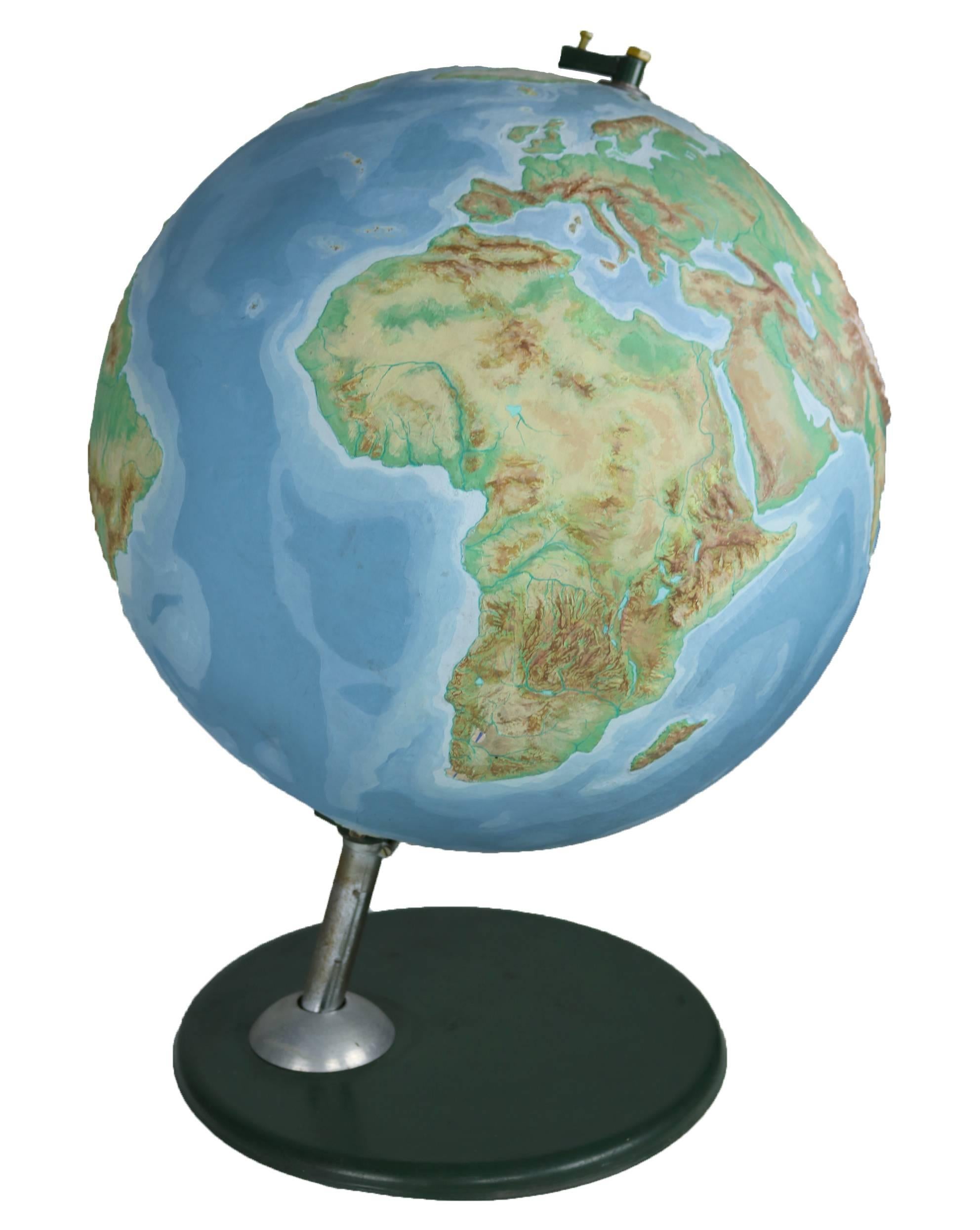 Large Midcentury Terestrial 3D globe. This undedicated globe showing the contours of the Earth on a carton papier globe.