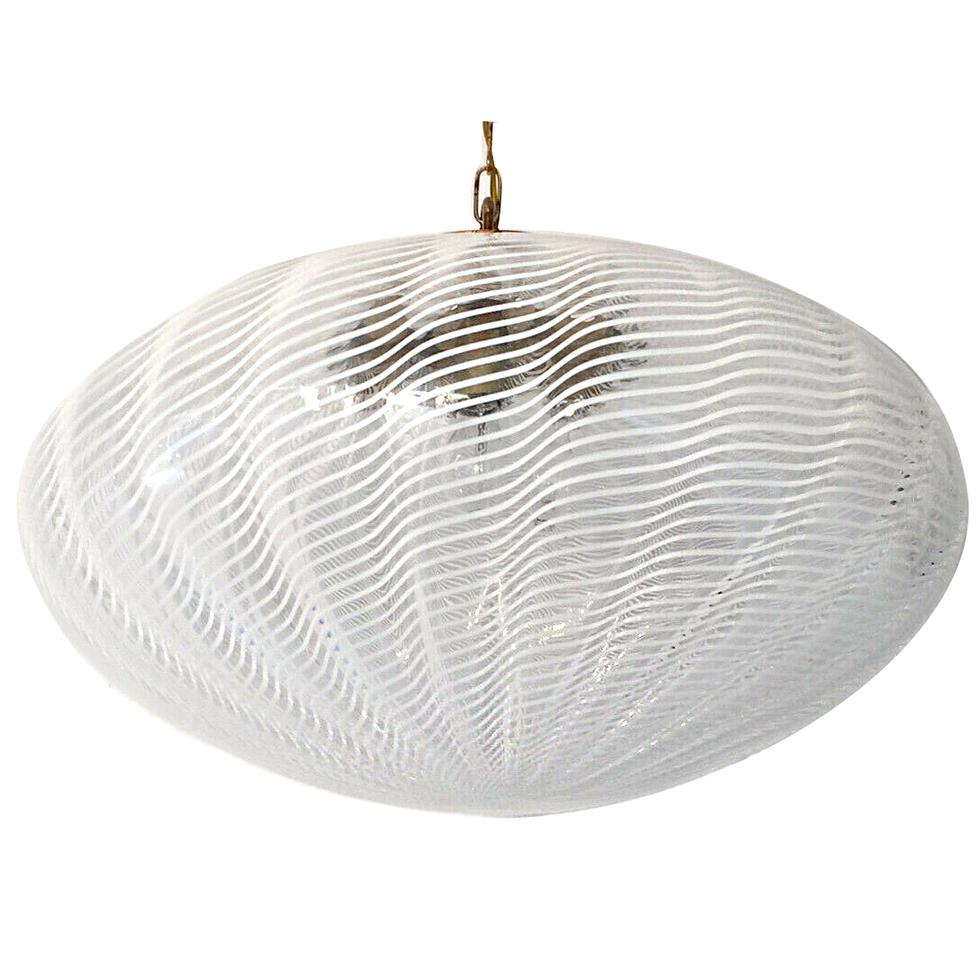 A large circa 1960s Italian blown glass light fixture with a white and clear ribbon pattern.

Measurements:
Diameter 19