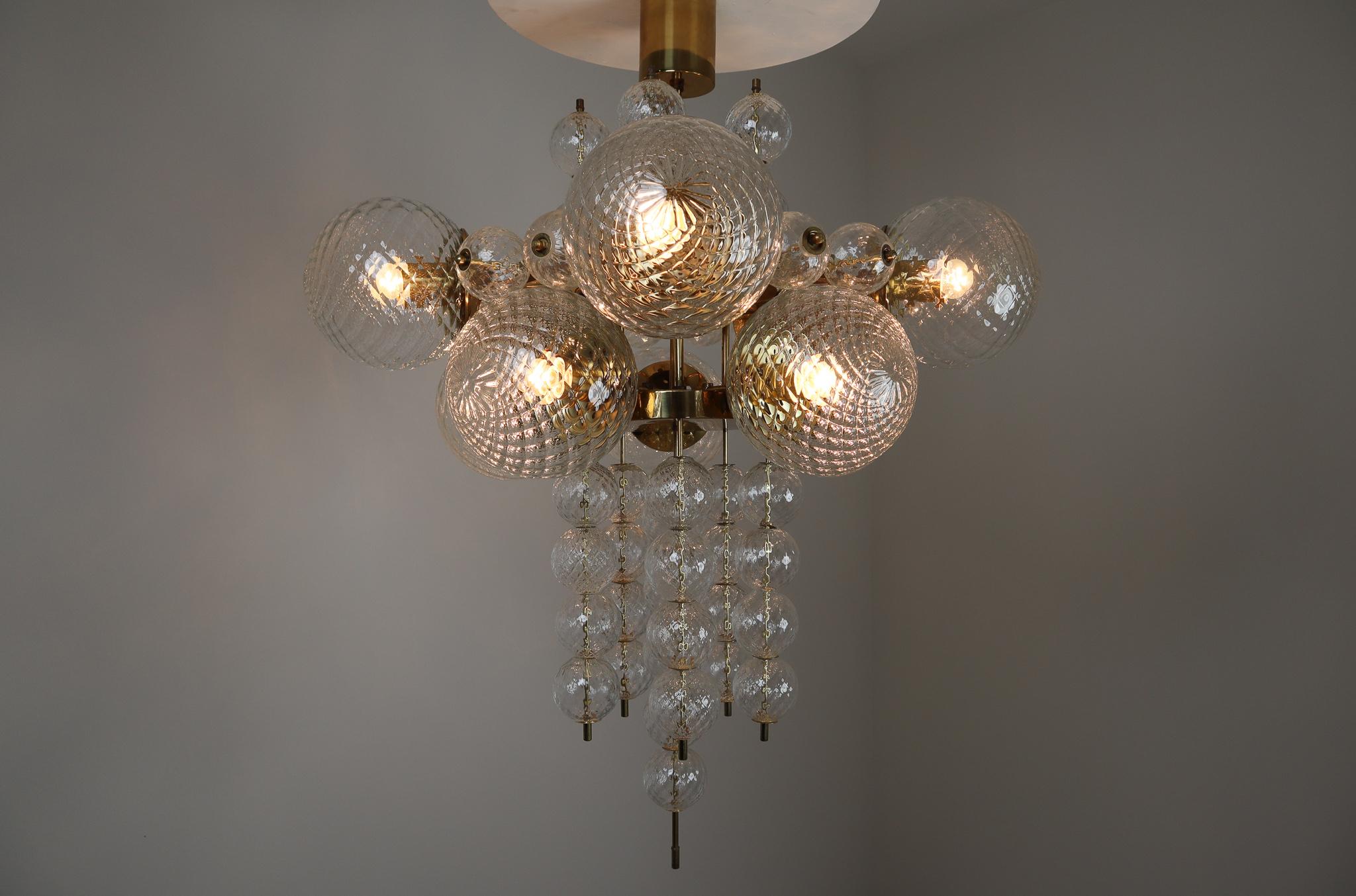 Late 20th Century Large Midcentury Chandelier with Brass Fixture and Structured Glass Europe 1970s