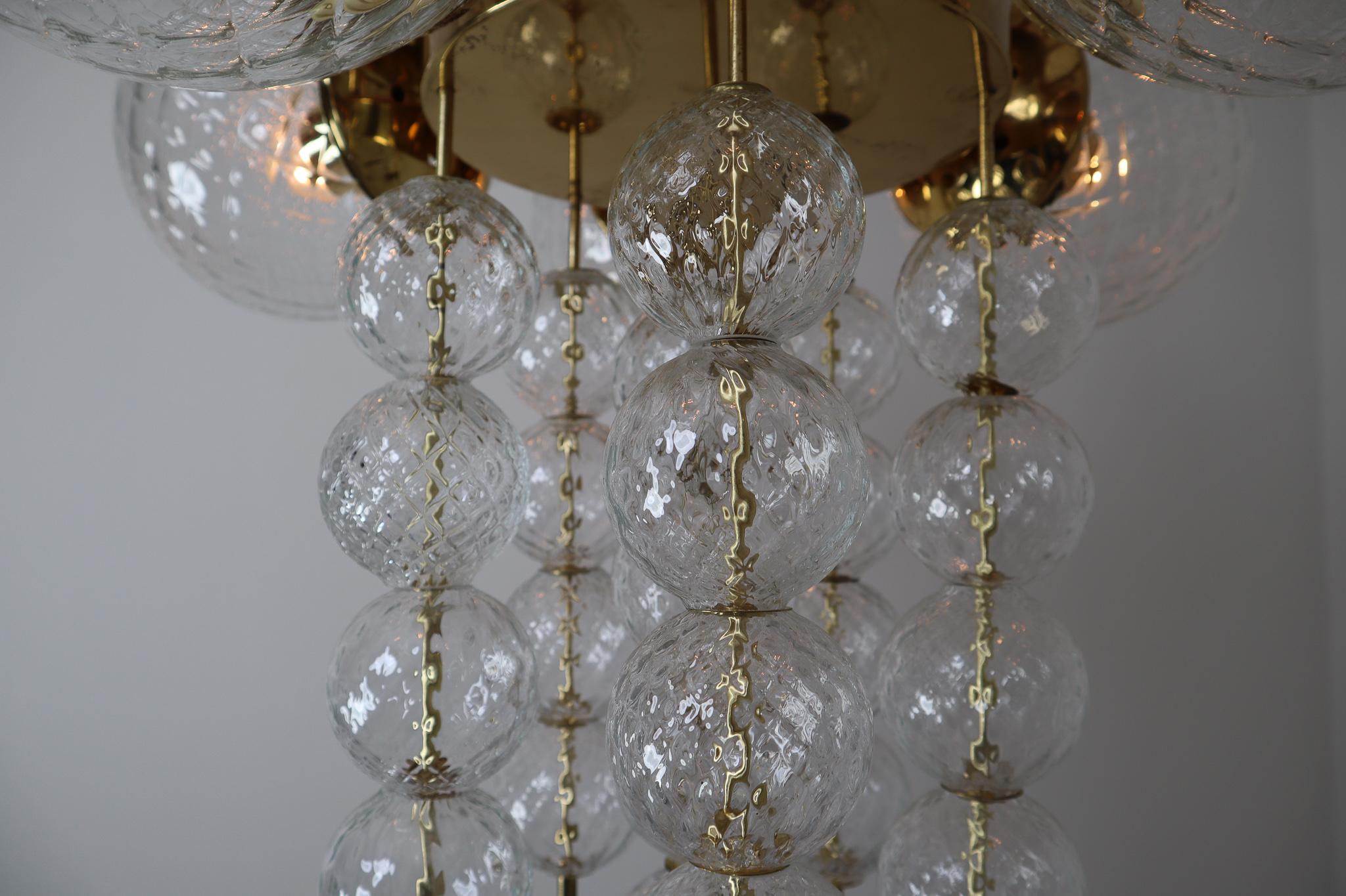 Large Midcentury Chandelier with Brass Fixture and Structured Glass Europe 1970s 3