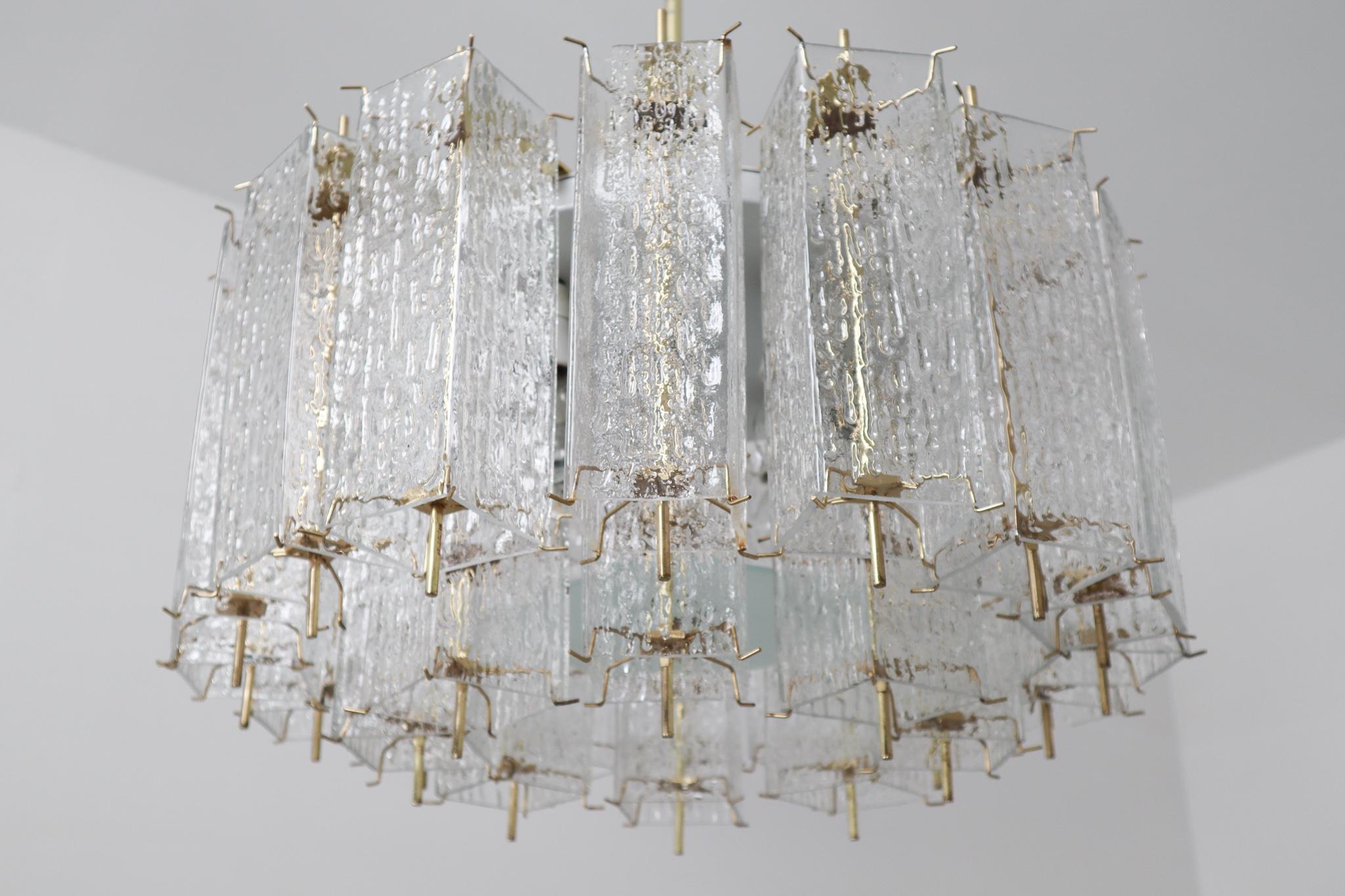 Large Midcentury Chandelier with Ice Glass Tubes in Brass Fixture Europe, 1960s In Good Condition For Sale In Almelo, NL