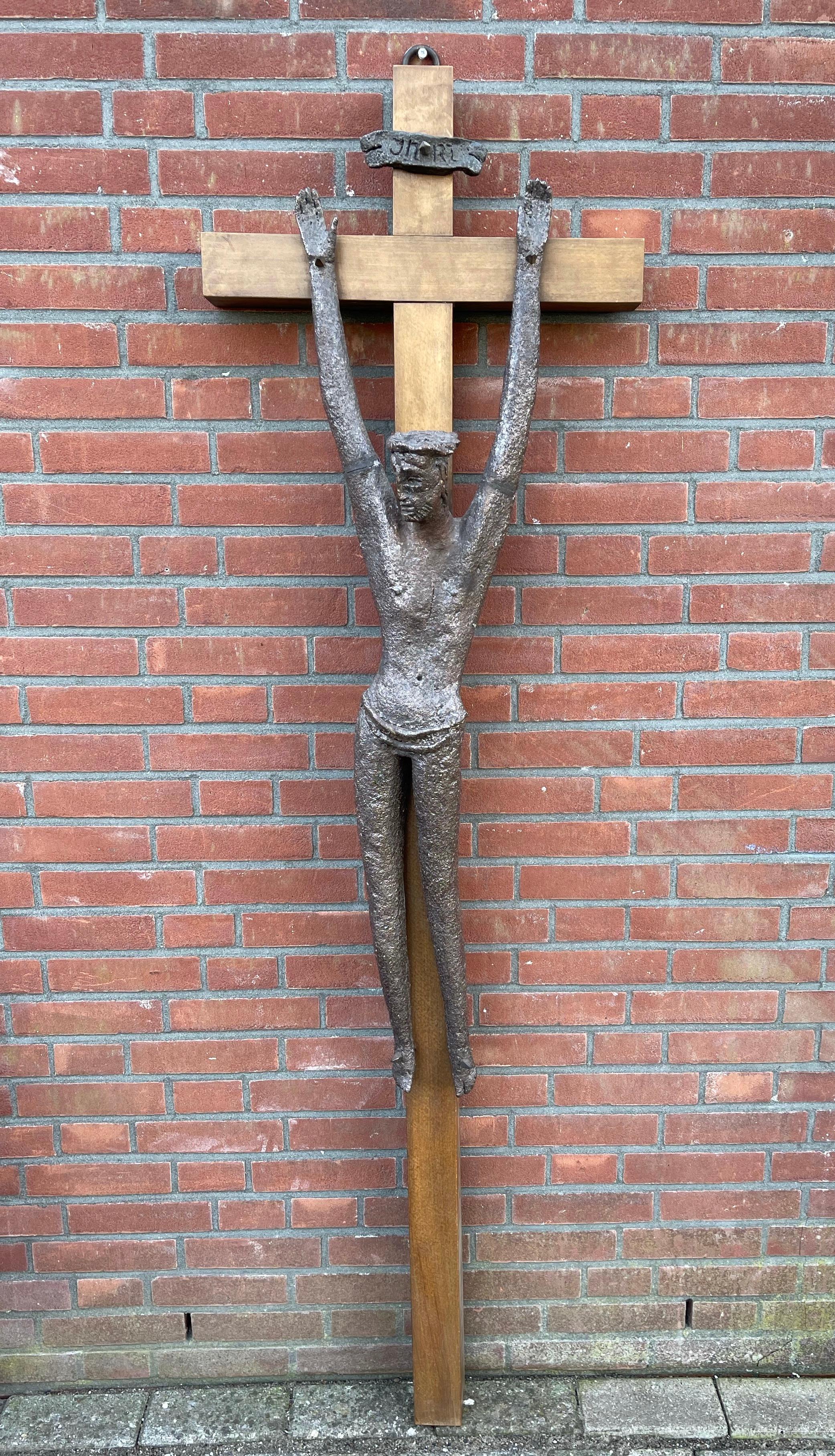 Unique and artistic crucifix from the European Midcentury Modern era.

Over the centuries the life and teachings of Christ have inspired many an artist to create His image in just as many ways as there were artist. In more recent decades the way