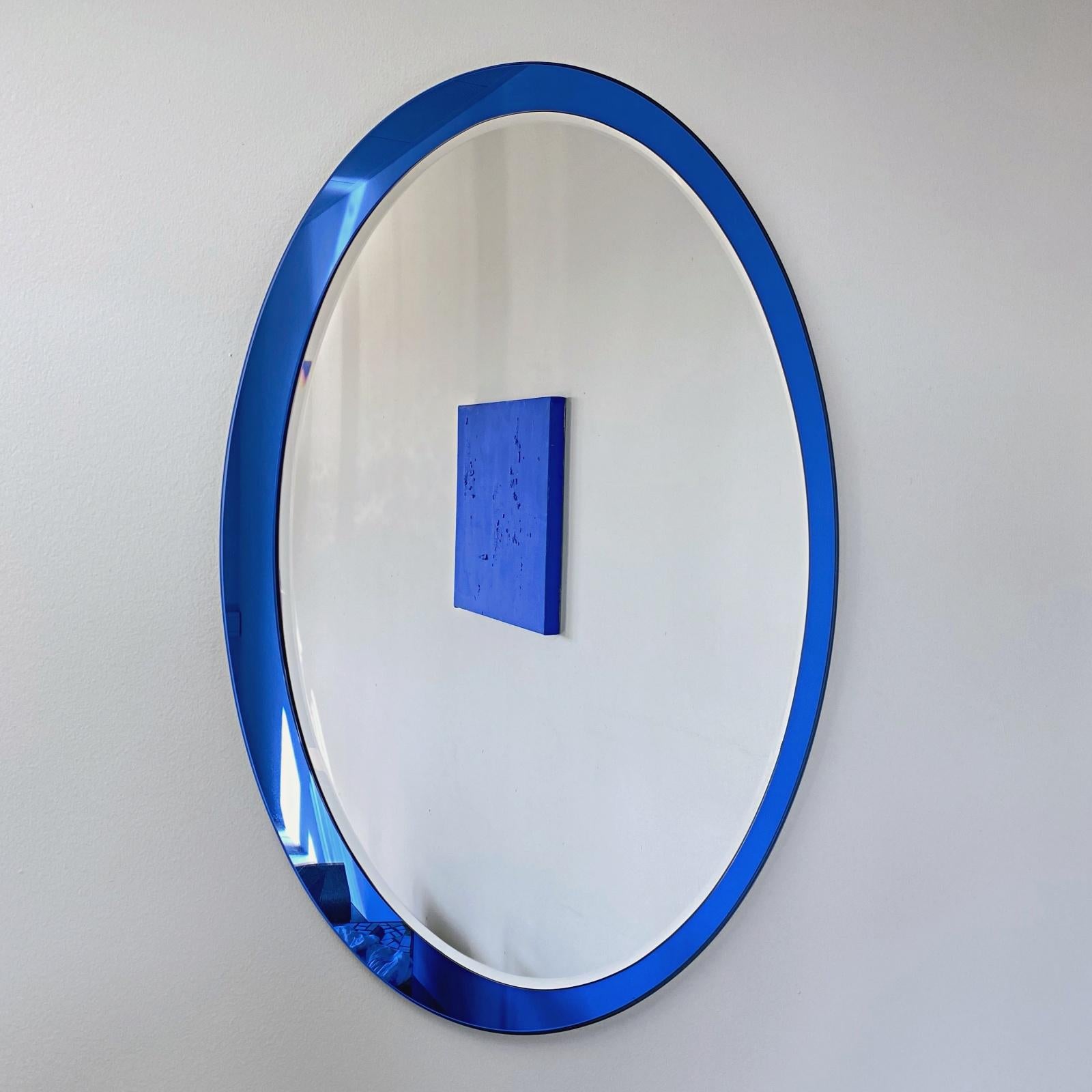 Mid-Century Modern Large Midcentury Fontana Arte Labeled Blue Edged Oval Wall Mirror, 1960s, Italy