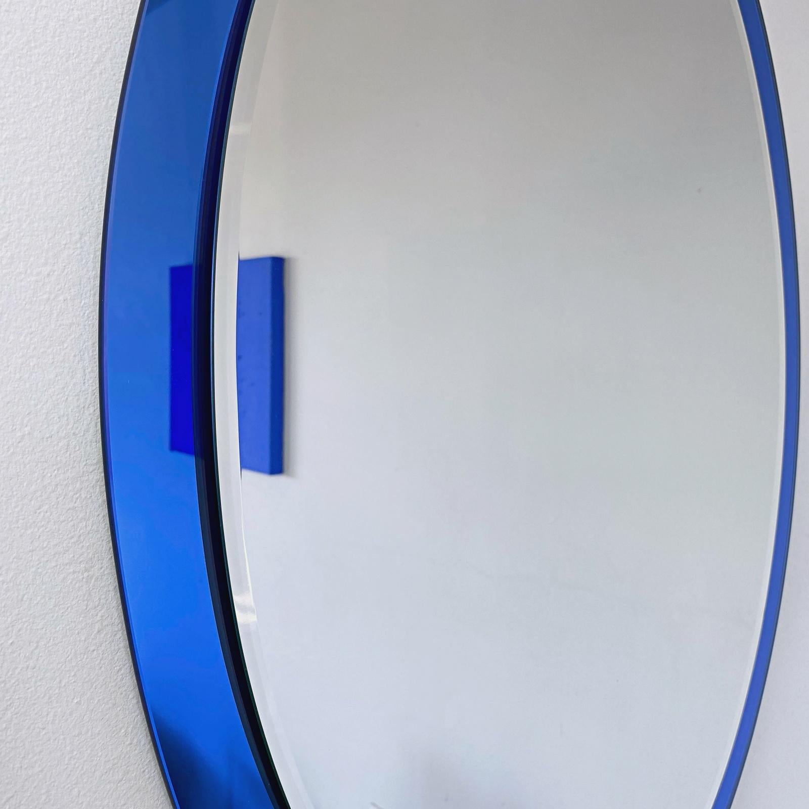 Italian Large Midcentury Fontana Arte Labeled Blue Edged Oval Wall Mirror, 1960s, Italy