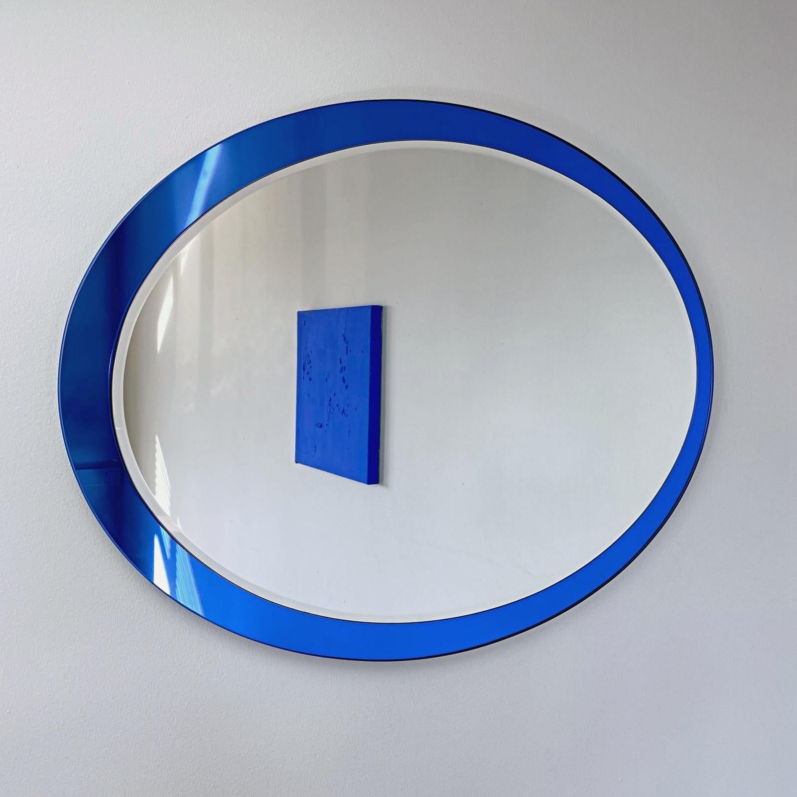 Faceted Large Midcentury Fontana Arte Labeled Blue Edged Oval Wall Mirror, 1960s, Italy