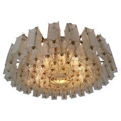 Large Midcentury Hotel Chandelier in Structured Glass and Brass from Europe 1960