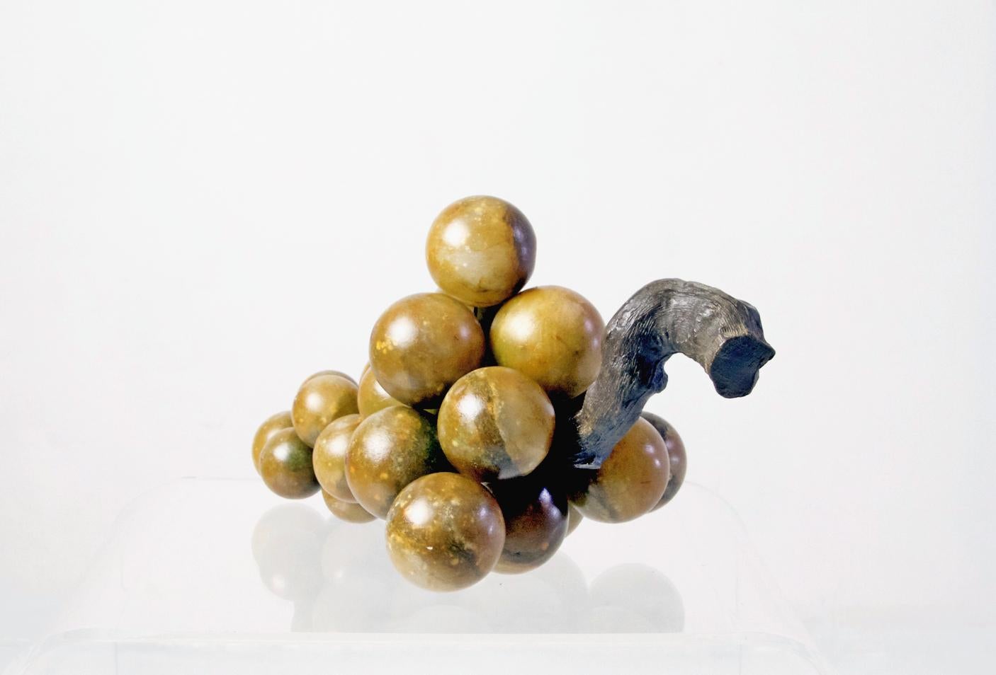 Original midcentury decorative grapes in painted alabaster with an olive branch for stem.
