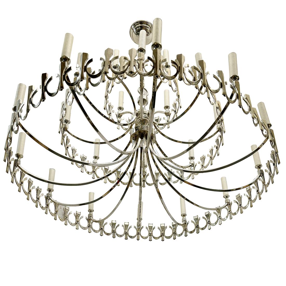 A circa 1960's Italian midcentury chandelier with 24 light in 2 levels. Silver and gilt finish.

Measurements:
Height: 37”
Diameter: 38”