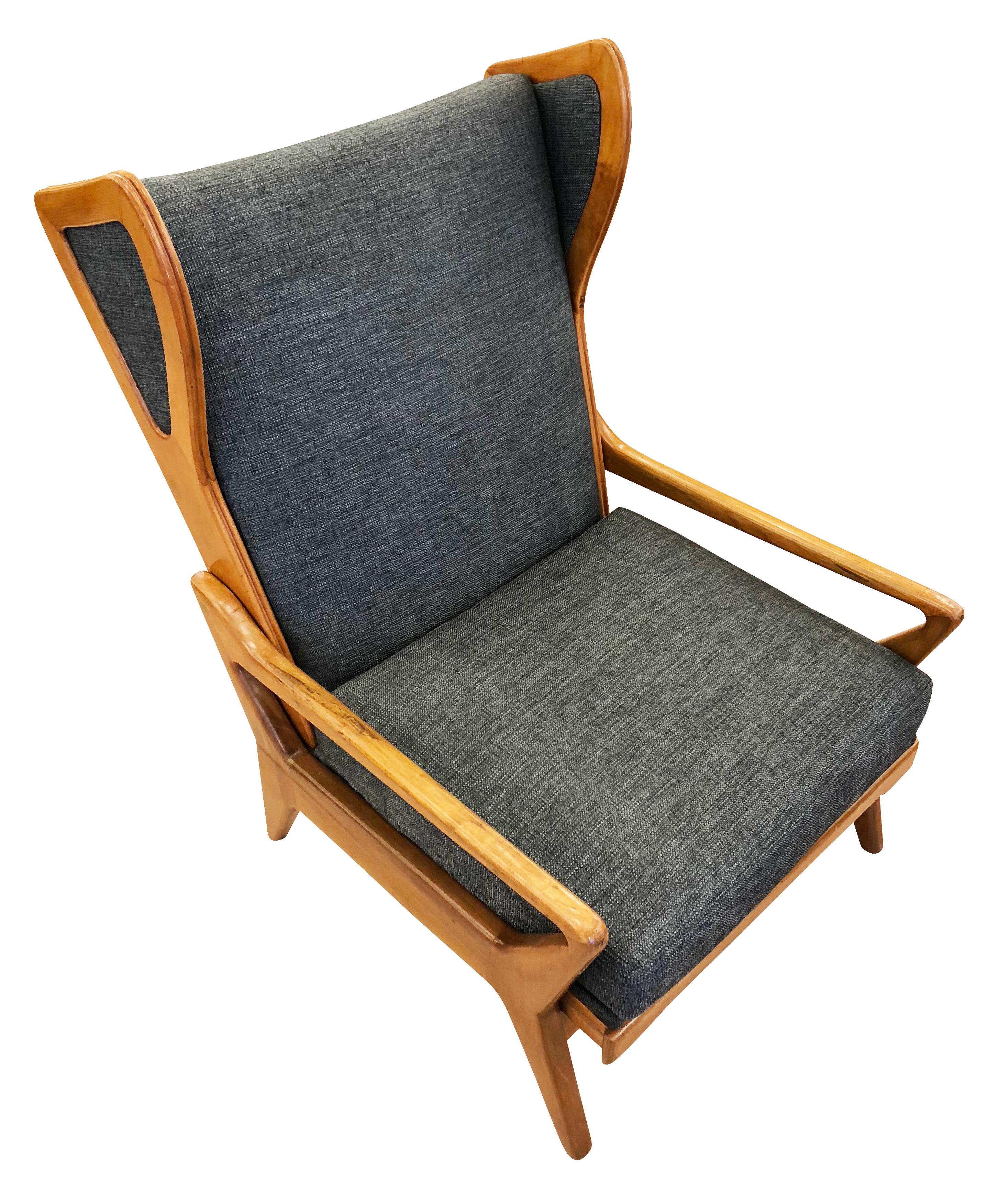 Very large Italian midcentury lounge chair with a light walnut frame and grey cotton upholstery.

Condition: Excellent vintage condition, minor wear consistent with age and use. Newly recovered.

Dimensions: Width: 28.5”

Depth: 35”

Height: