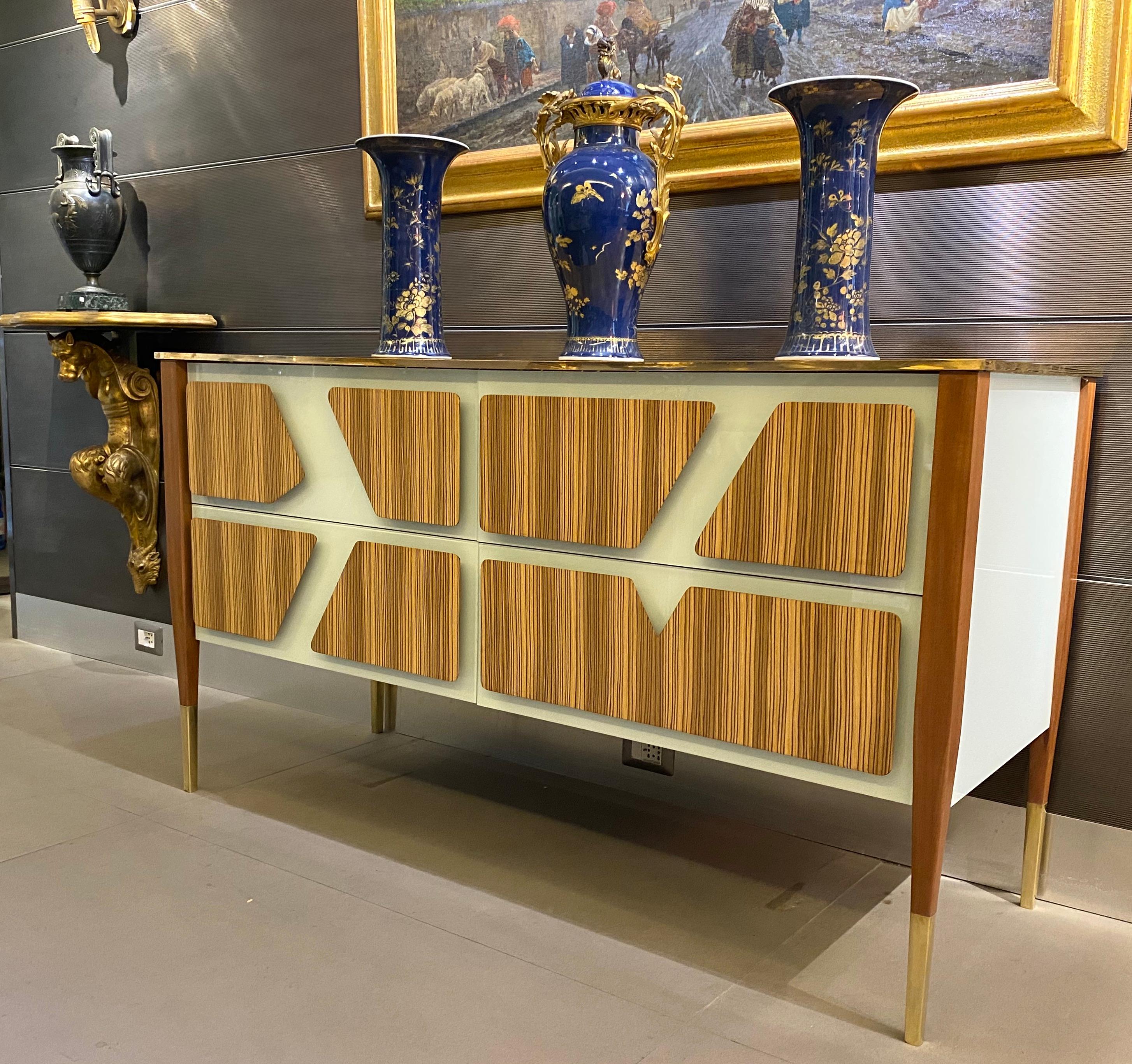 Large light grey Murano glass and wood commode or chest of drawer, raised on special brass legs 
Handmade by a master artisan.
 